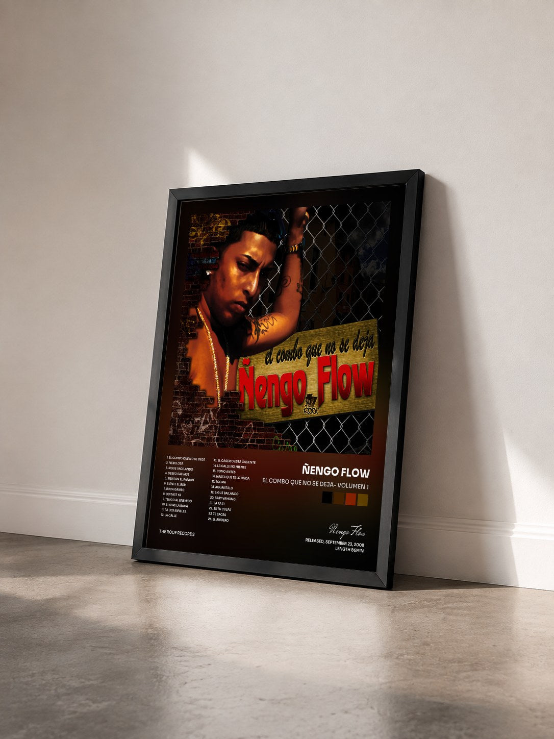 #noir Tableau de l'album El Combo Que No Se Deja- Volumen 1 de Ñengo Flow vu de trois quarts, cadre noir