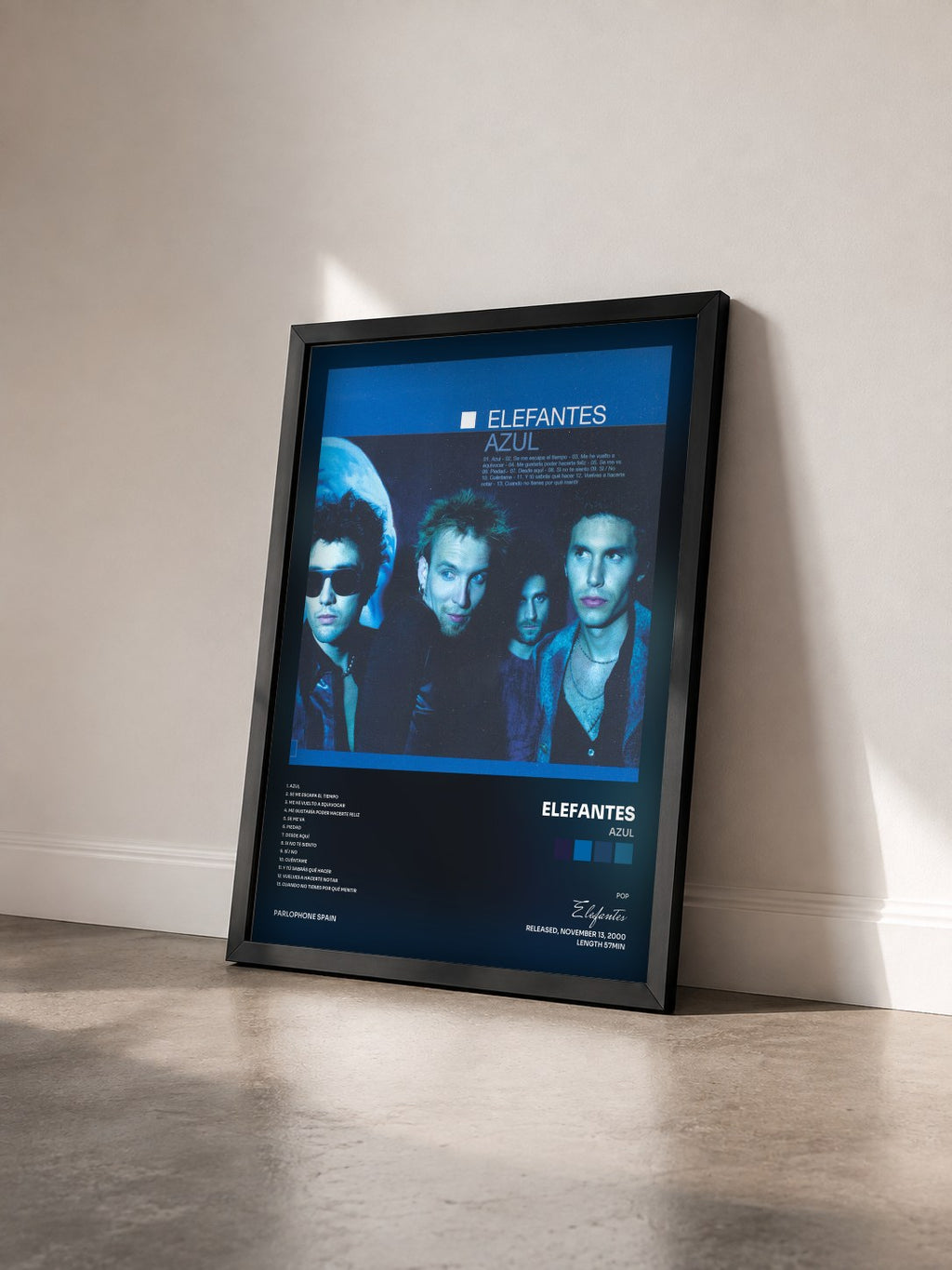 #noir Tableau de l'album Azul de Elefantes vu de trois quarts, cadre noir