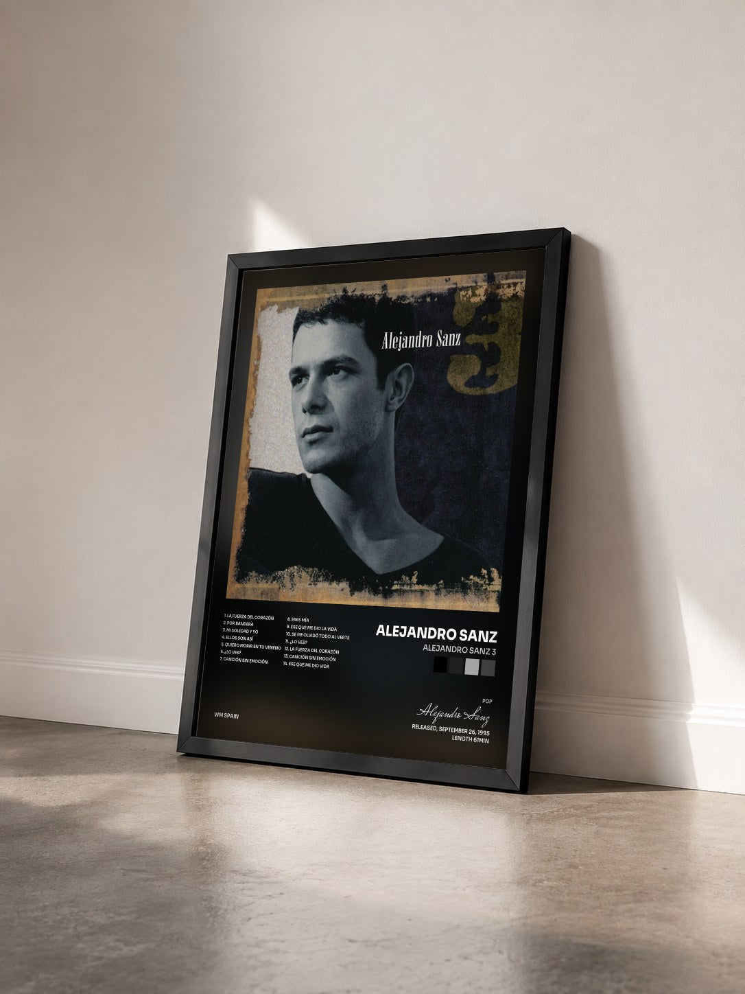 #noir Tableau de l'album Alejandro Sanz 3 de Alejandro Sanz vu de trois quarts, cadre noir