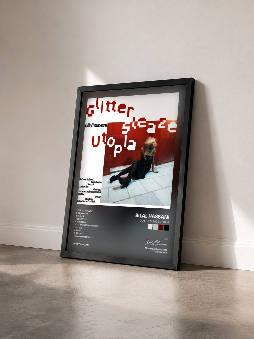 #noir Tableau de l'album Glitter Sleaze Utopia de Bilal Hassani vu de trois quarts, cadre noir
