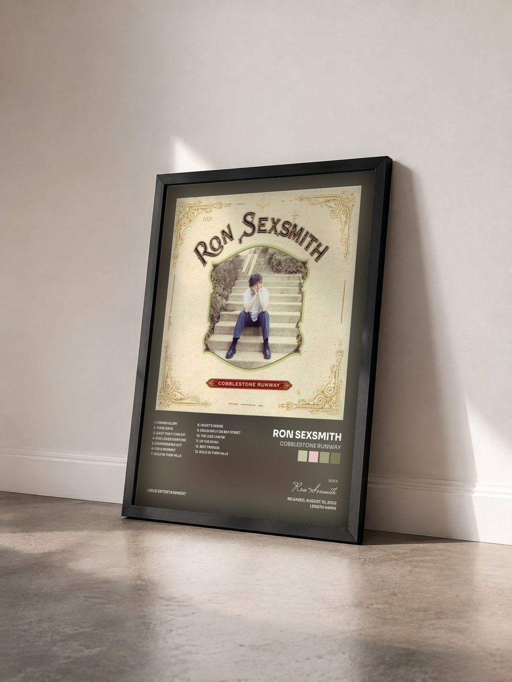 #noir Tableau de l'album Cobblestone Runway de Ron Sexsmith vu de trois quarts, cadre noir