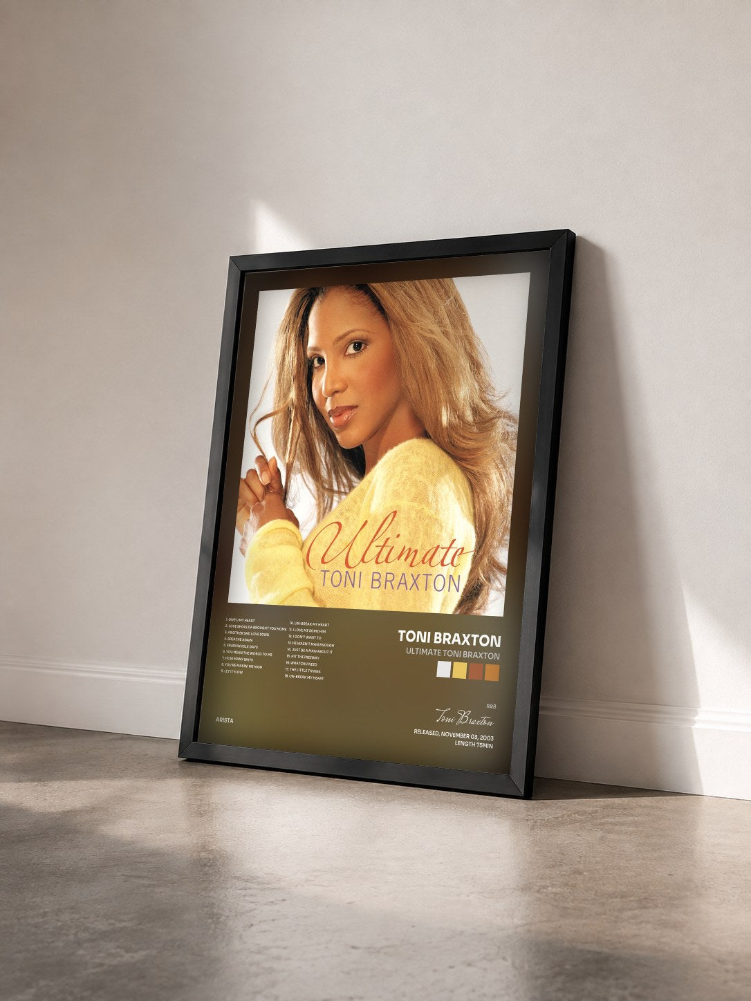 #noir Tableau de l'album Ultimate Toni Braxton de Toni Braxton vu de trois quarts, cadre noir