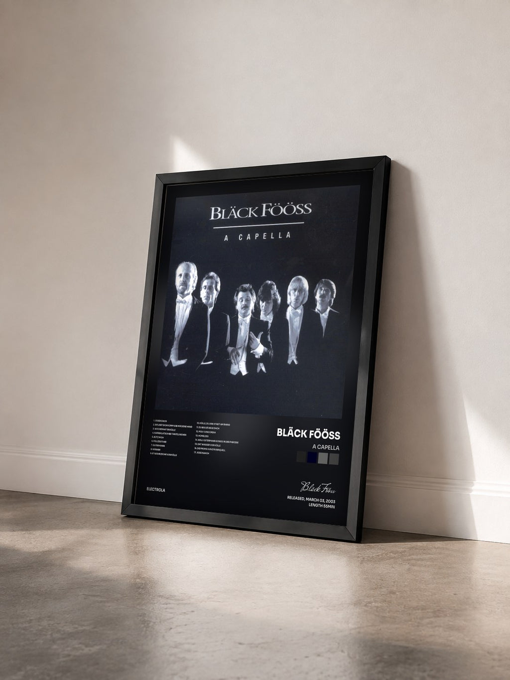 #noir Tableau de l'album A Capella de Bläck Fööss vu de trois quarts, cadre noir