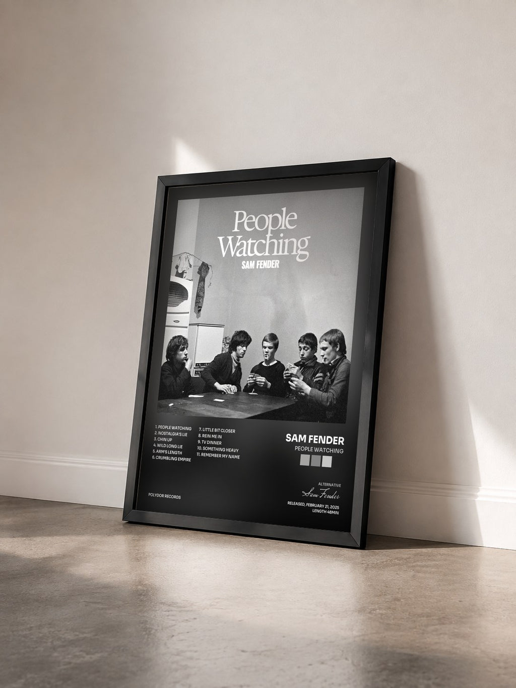 #noir Tableau de l'album People Watching de Sam Fender vu de trois quarts, cadre noir