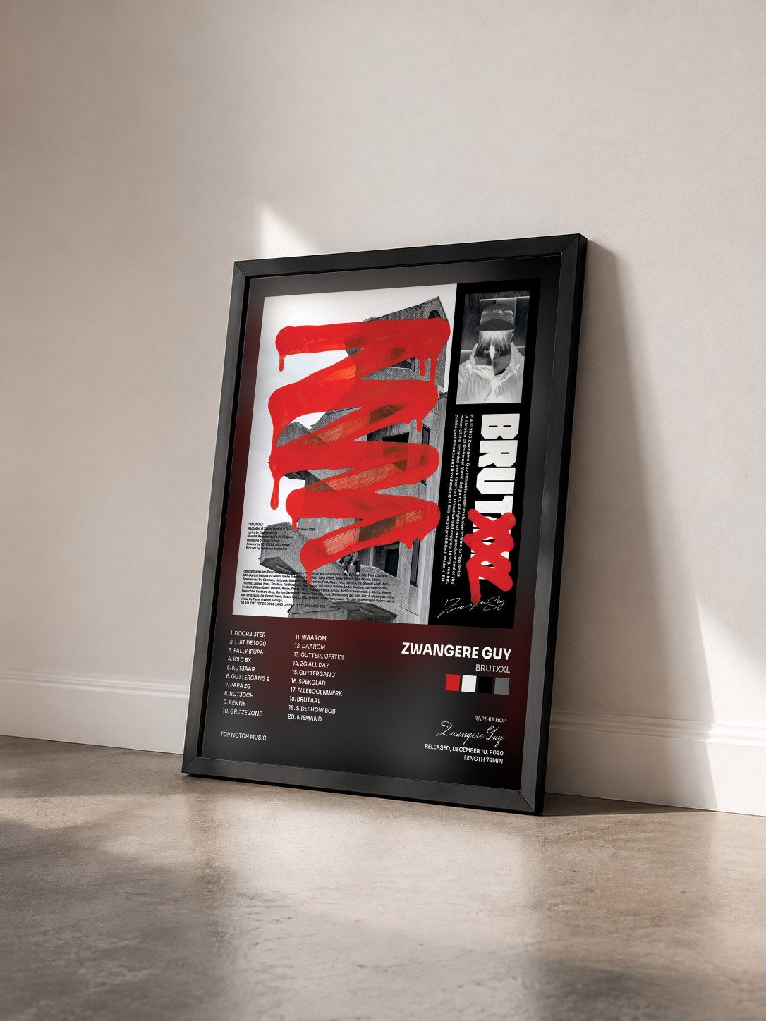 #noir Tableau de l'album BRUTXXL de Zwangere Guy vu de trois quarts, cadre noir