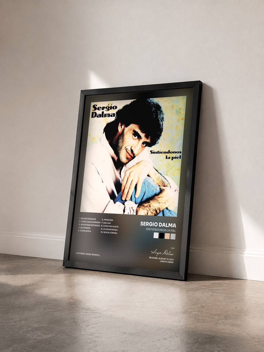#noir Tableau de l'album Sintiendonos La Piel de Sergio Dalma vu de trois quarts, cadre noir