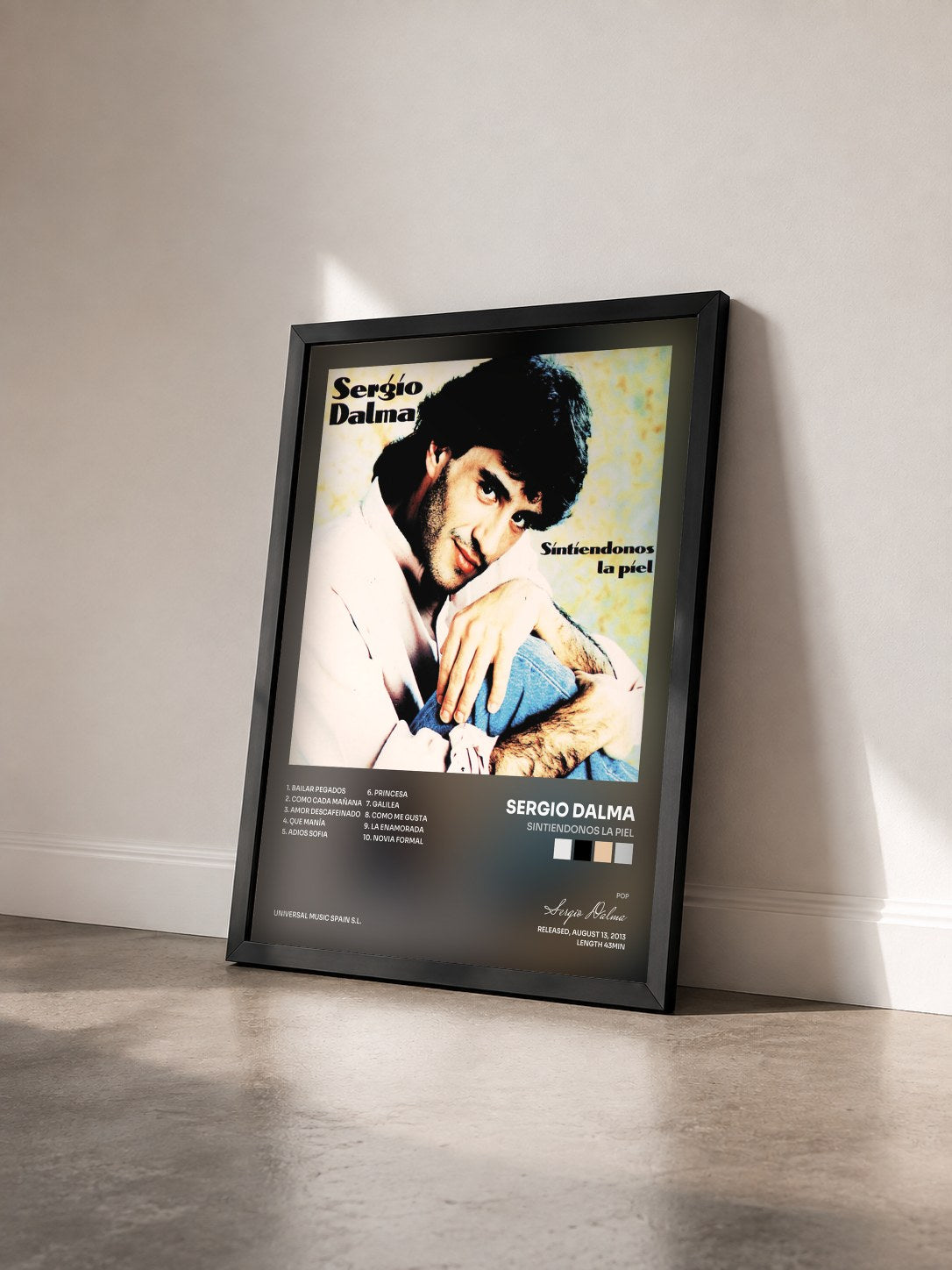 #noir Tableau de l'album Sintiendonos La Piel de Sergio Dalma vu de trois quarts, cadre noir