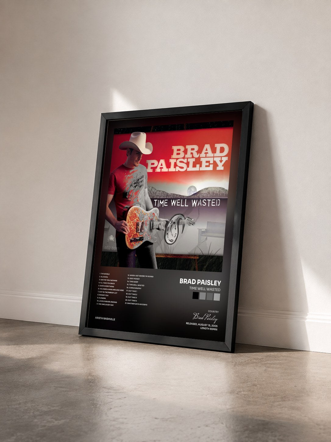 #noir Tableau de l'album Time Well Wasted de Brad Paisley vu de trois quarts, cadre noir