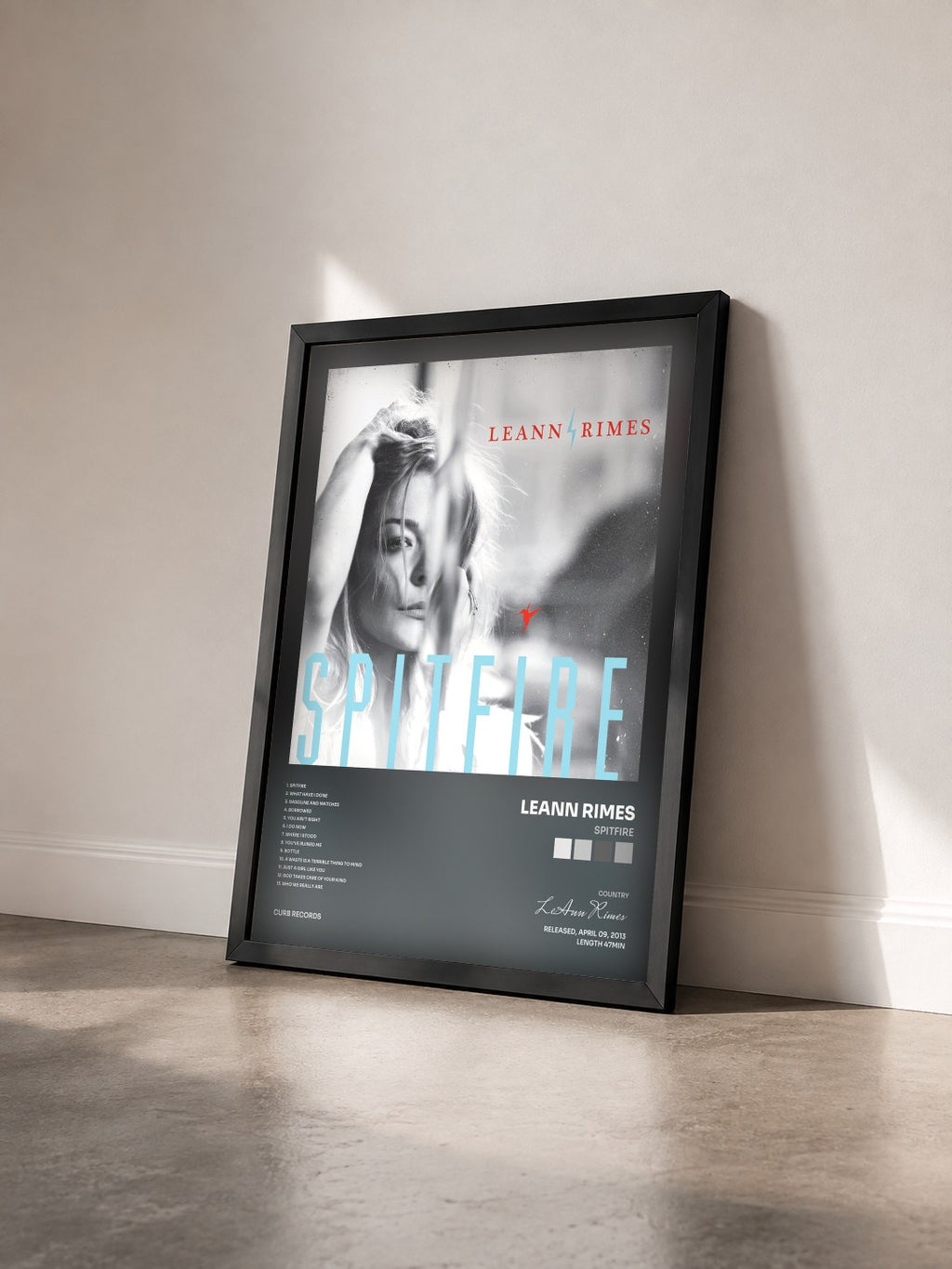 #noir Tableau de l'album Spitfire de LeAnn Rimes vu de trois quarts, cadre noir