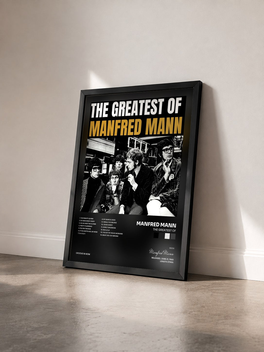 #noir Tableau de l'album The Greatest Of de Manfred Mann vu de trois quarts, cadre noir