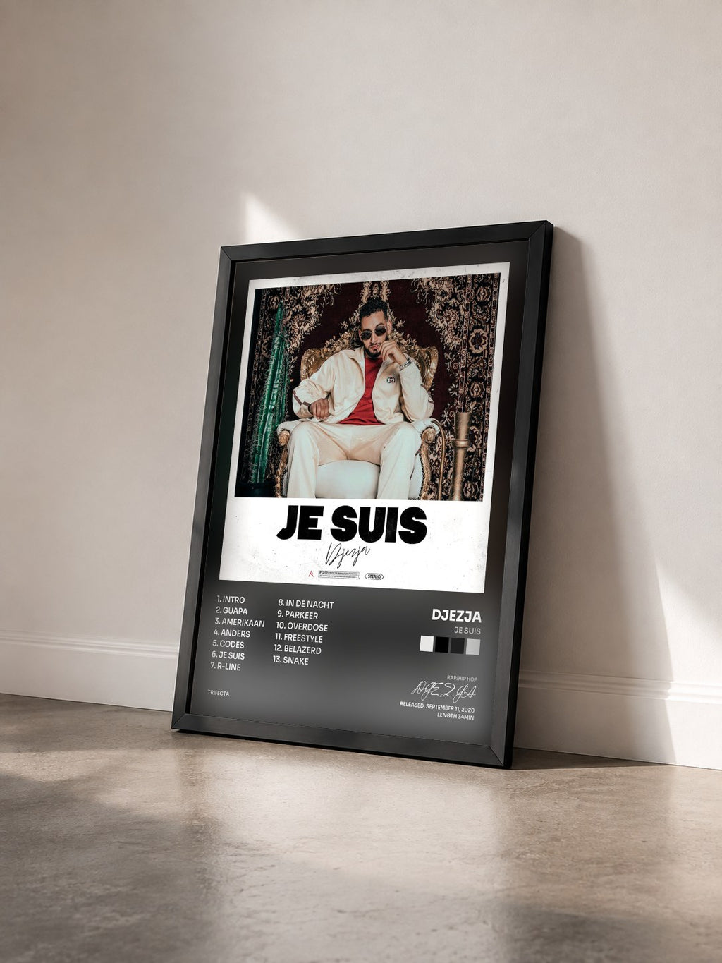 #noir Tableau de l'album Je Suis de DJEZJA vu de trois quarts, cadre noir