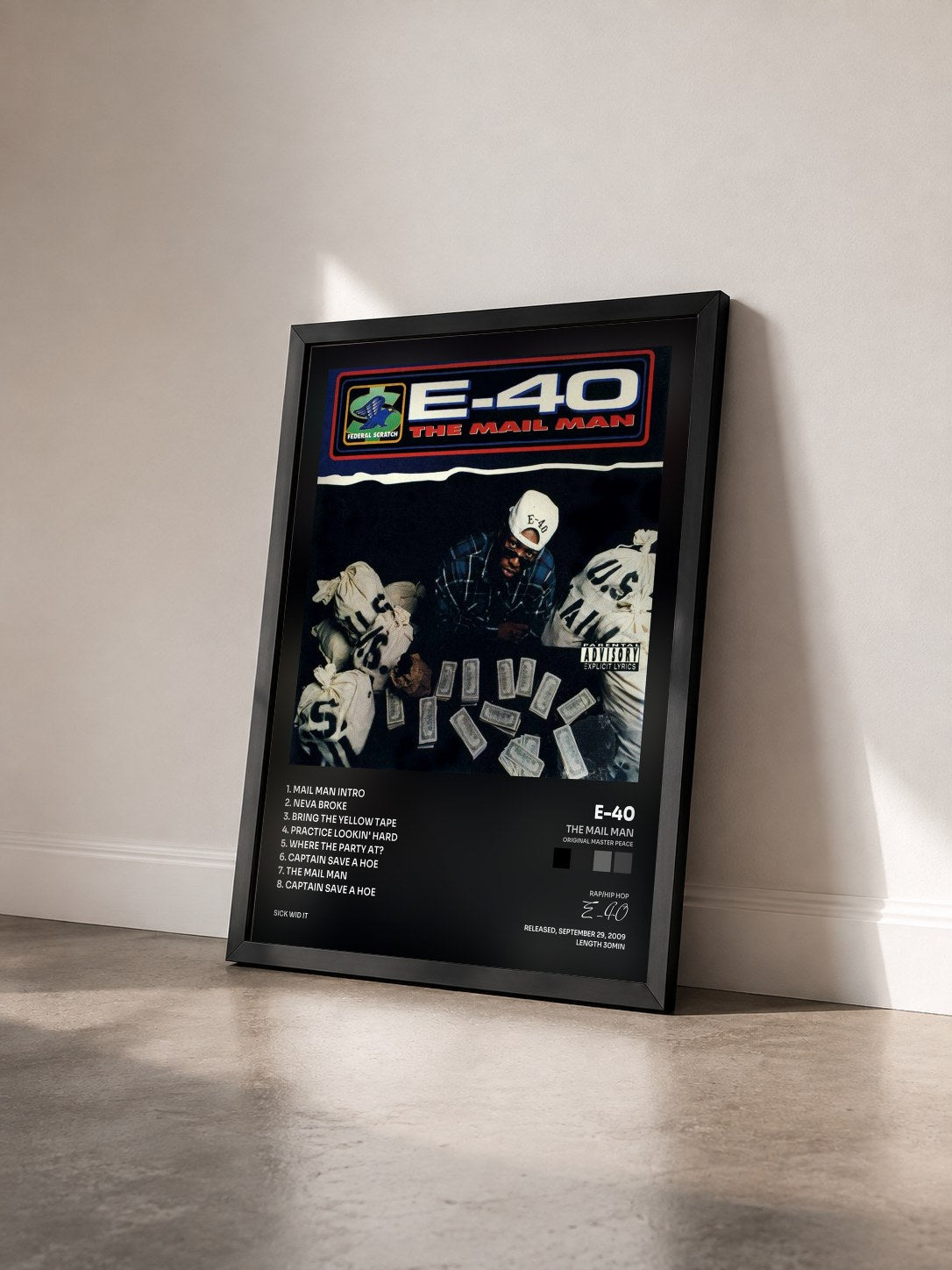 #noir Tableau de l'album The Mail Man (Original Master Peace) de E-40 vu de trois quarts, cadre noir
