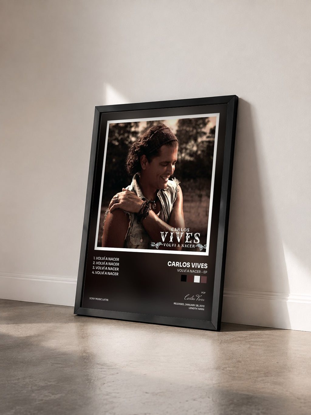 #noir Tableau de l'album Volví A Nacer - EP de Carlos Vives vu de trois quarts, cadre noir