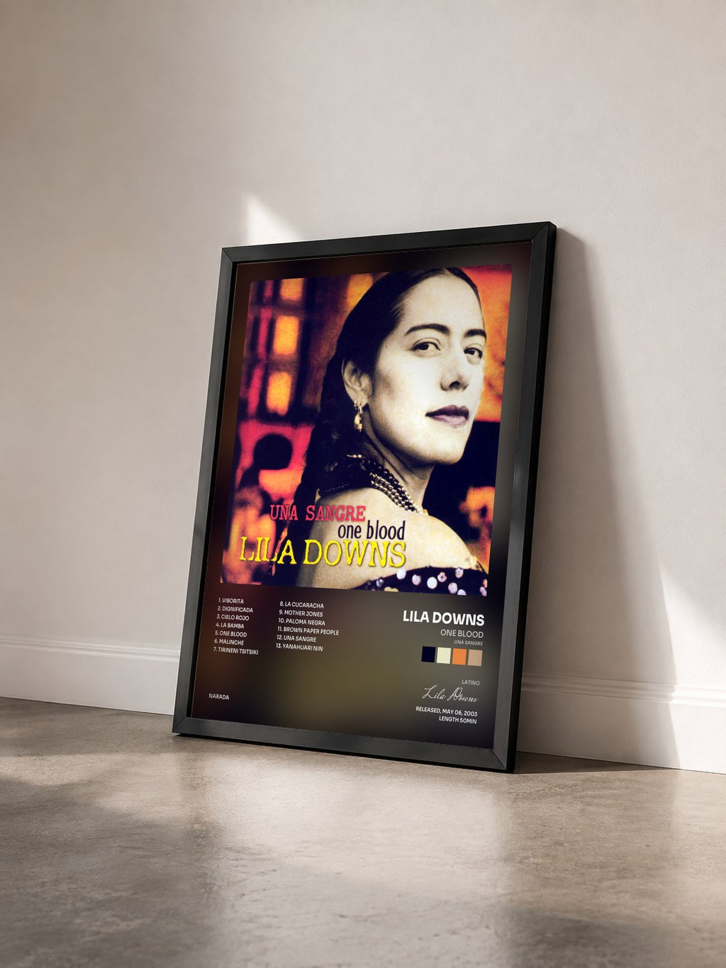 #noir Tableau de l'album One Blood (Una Sangre) de Lila Downs vu de trois quarts, cadre noir