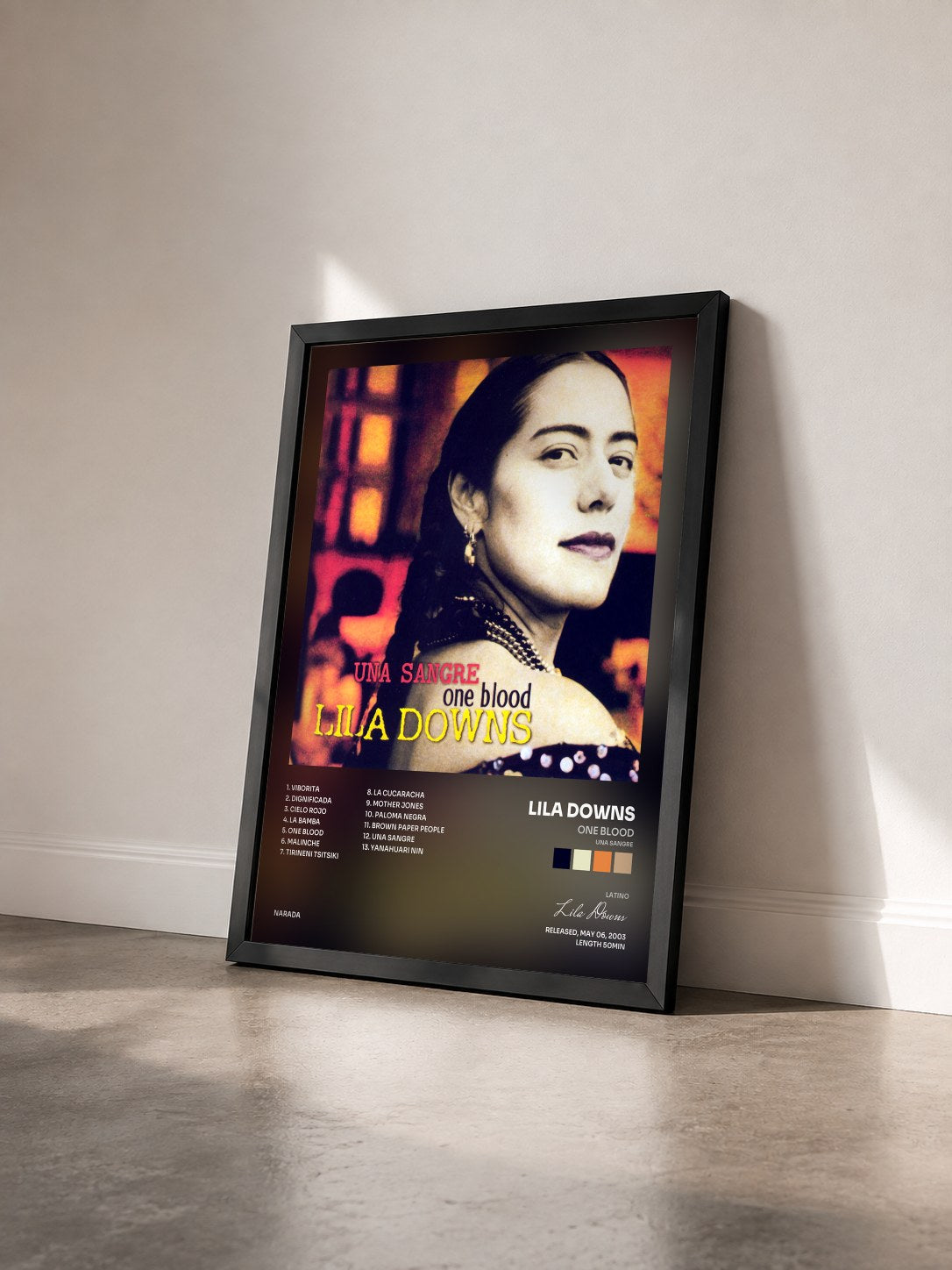 #noir Tableau de l'album One Blood (Una Sangre) de Lila Downs vu de trois quarts, cadre noir