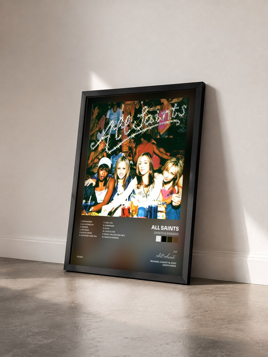#noir Tableau de l'album Saints & Sinners de All Saints vu de trois quarts, cadre noir