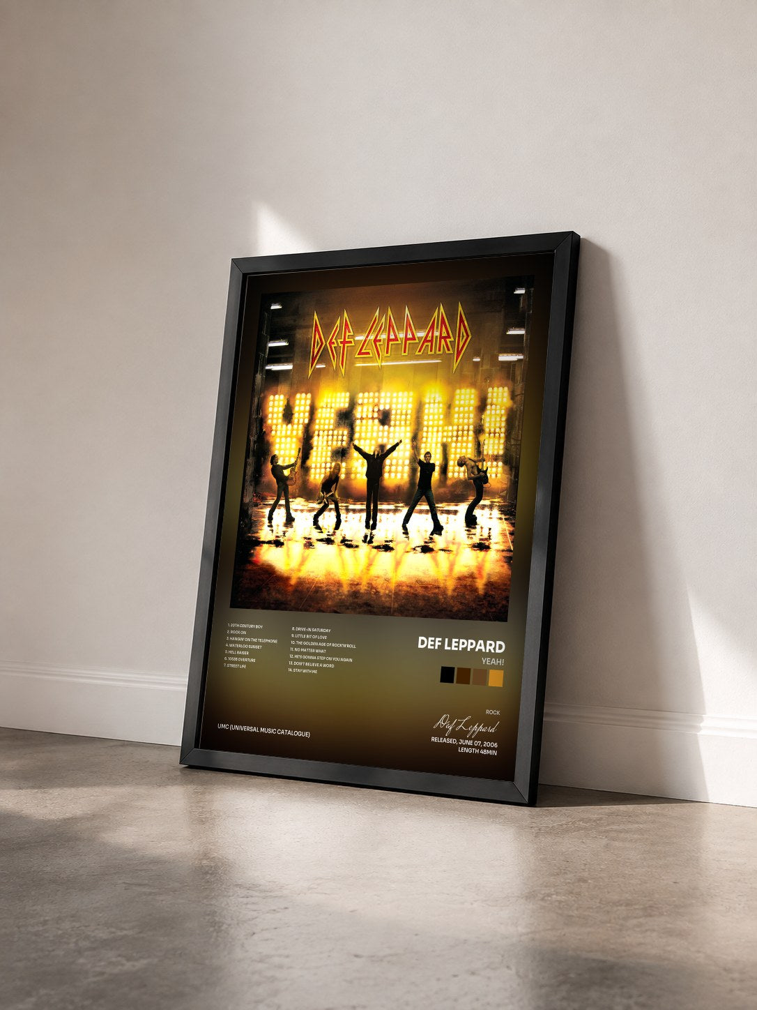 #noir Tableau de l'album Yeah! de Def Leppard vu de trois quarts, cadre noir