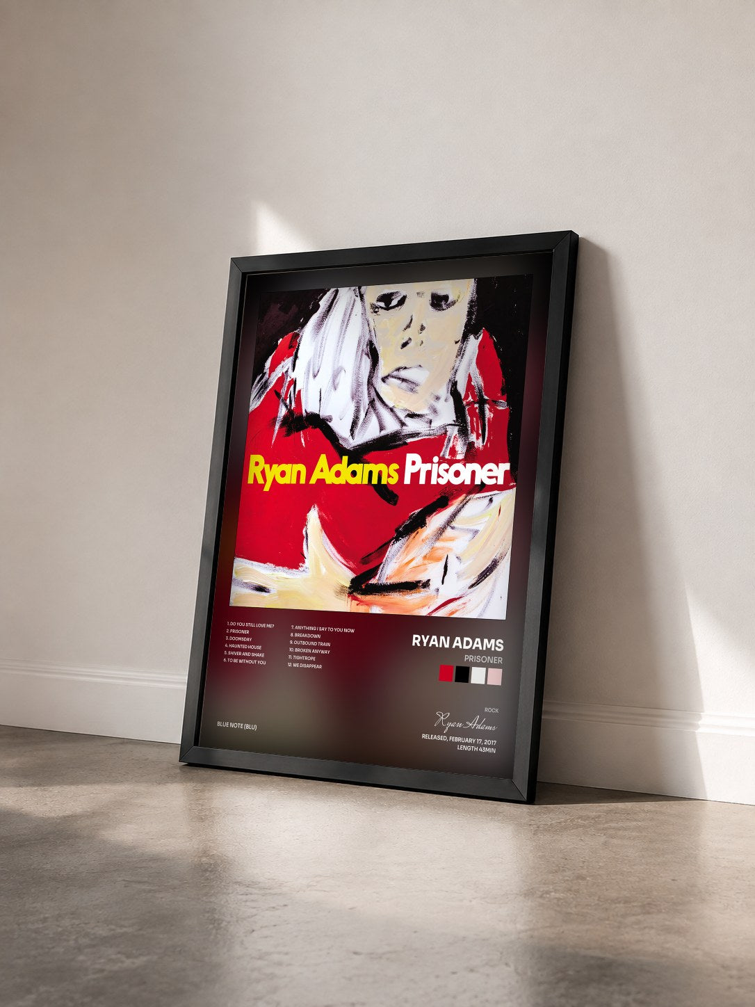 #noir Tableau de l'album Prisoner de Ryan Adams vu de trois quarts, cadre noir