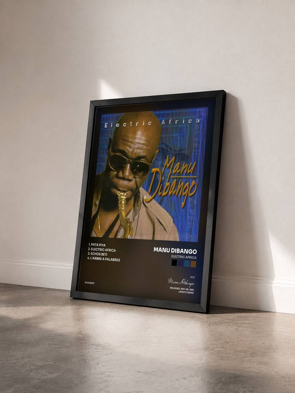 #noir Tableau de l'album Electric Africa de Manu Dibango vu de trois quarts, cadre noir