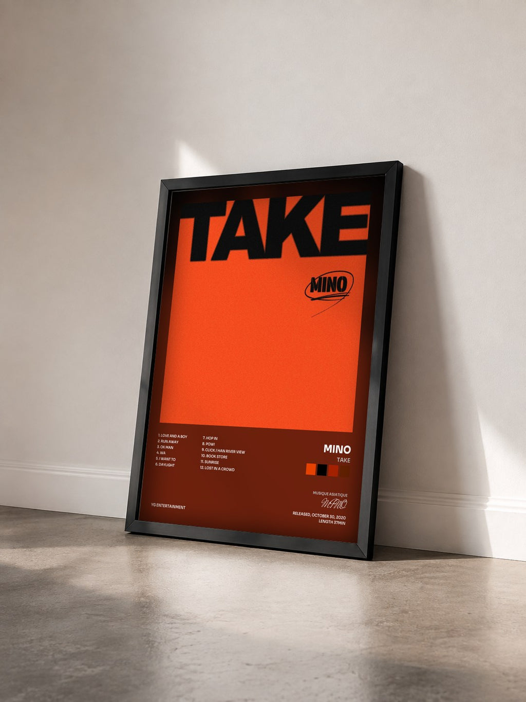 #noir Tableau de l'album TAKE de MINO vu de trois quarts, cadre noir