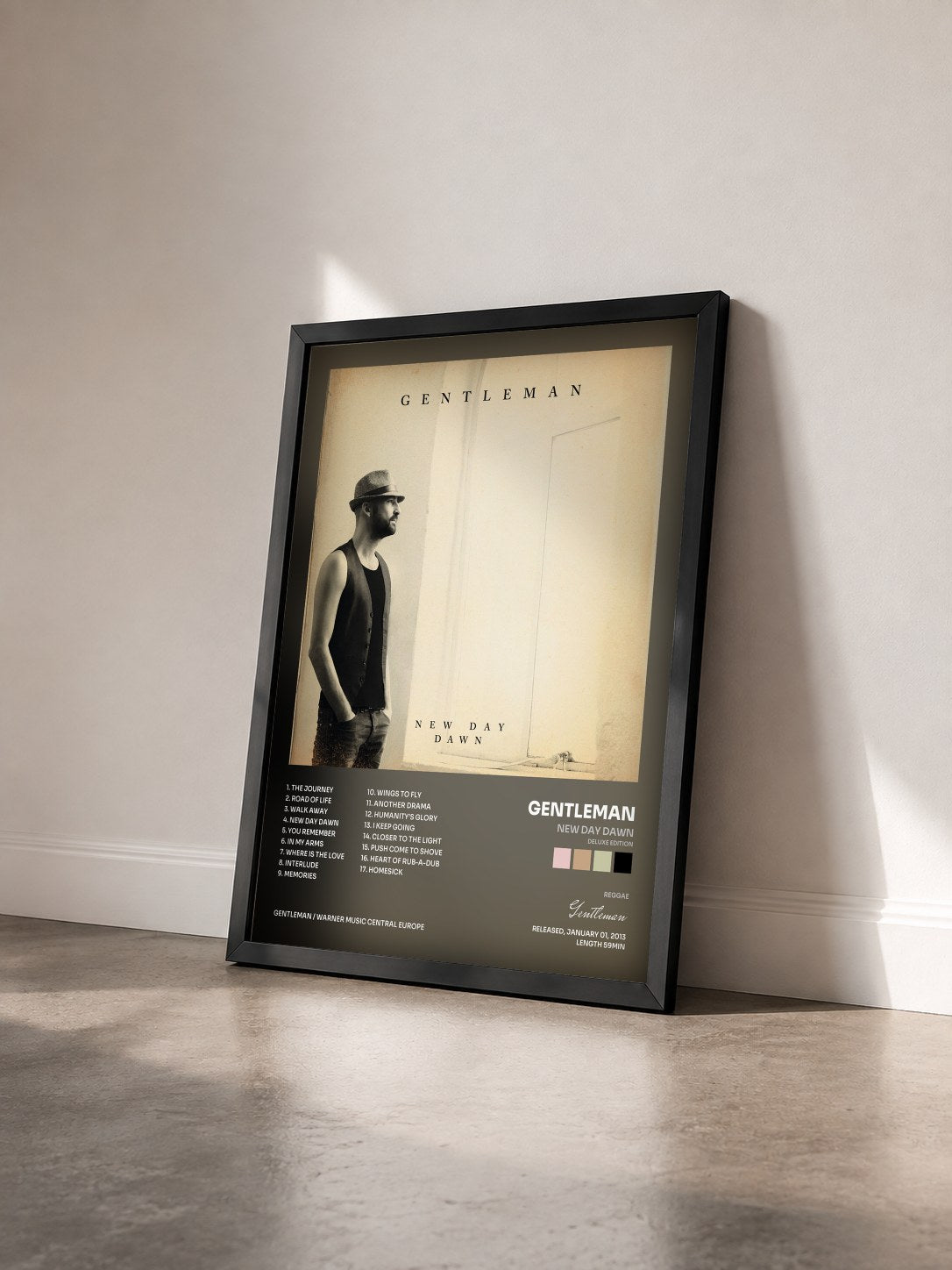 #noir Tableau de l'album New Day Dawn (Deluxe Edition) de Gentleman vu de trois quarts, cadre noir