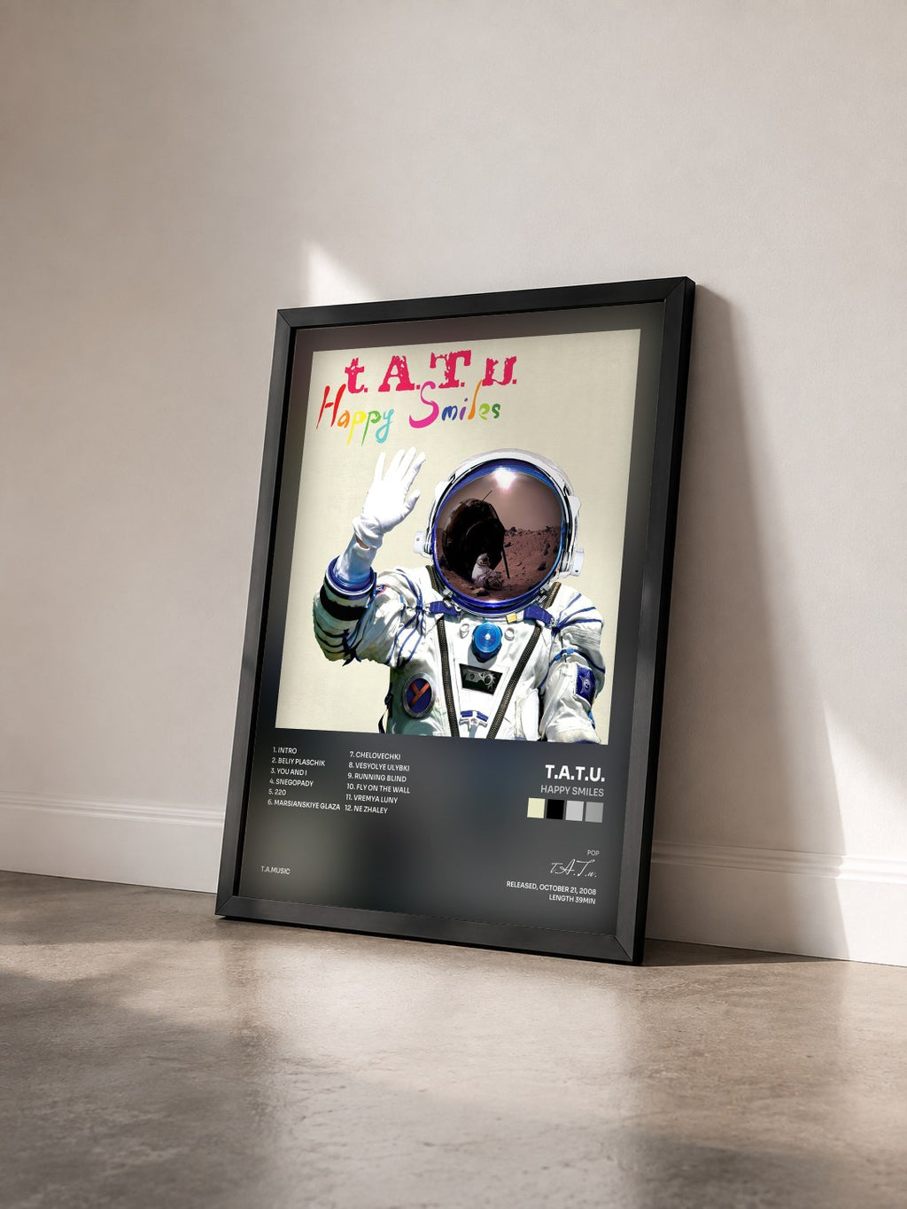 #noir Tableau de l'album Happy Smiles de t.A.T.u. vu de trois quarts, cadre noir