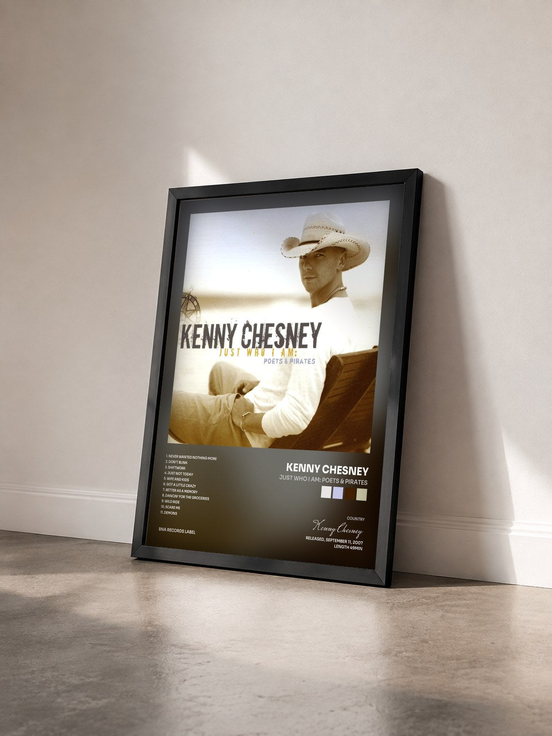 #noir Tableau de l'album Just Who I Am: Poets & Pirates de Kenny Chesney vu de trois quarts, cadre noir