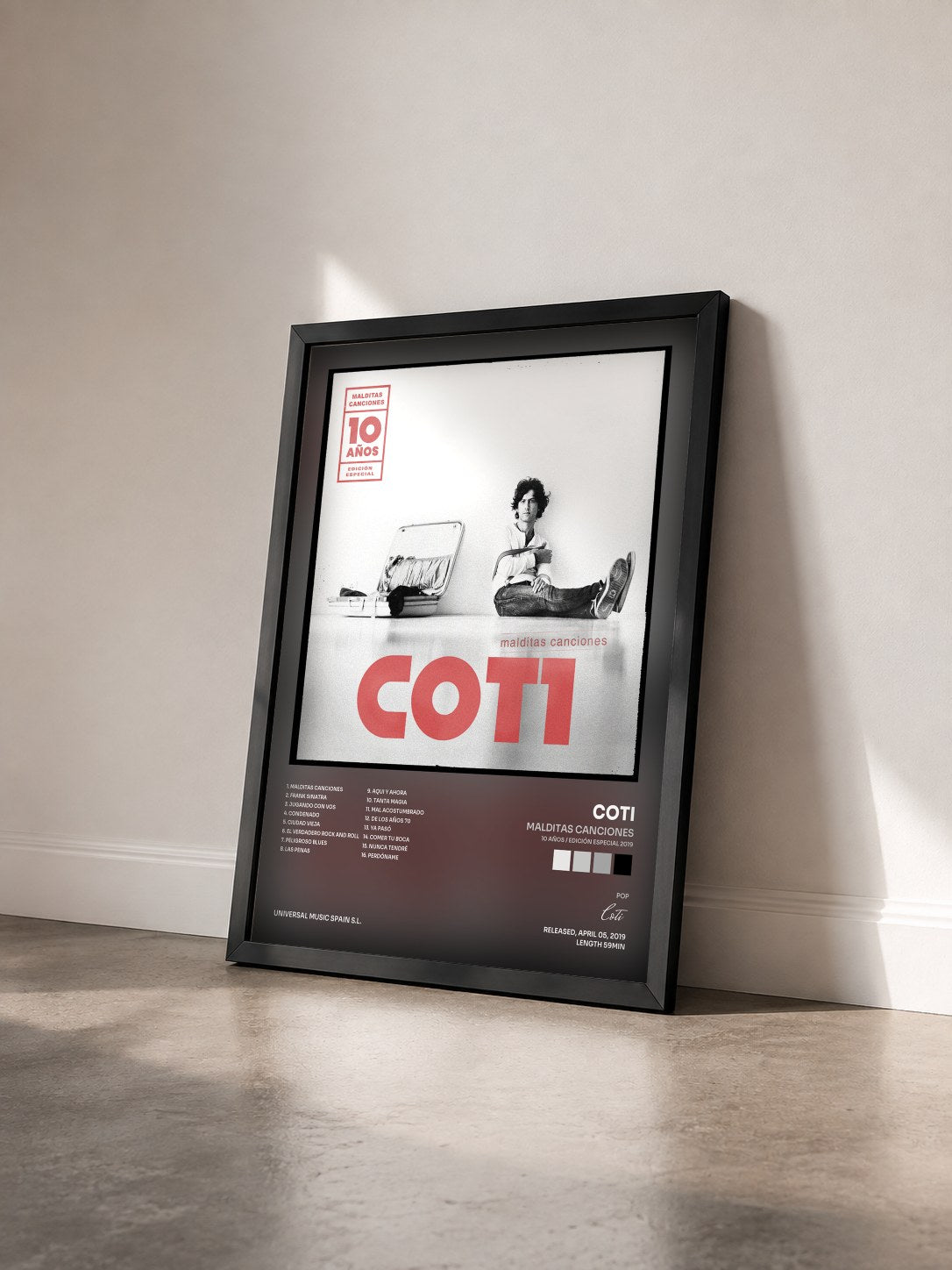 #noir Tableau de l'album Malditas Canciones (10 Años / Edición Especial 2019) de Coti vu de trois quarts, cadre noir