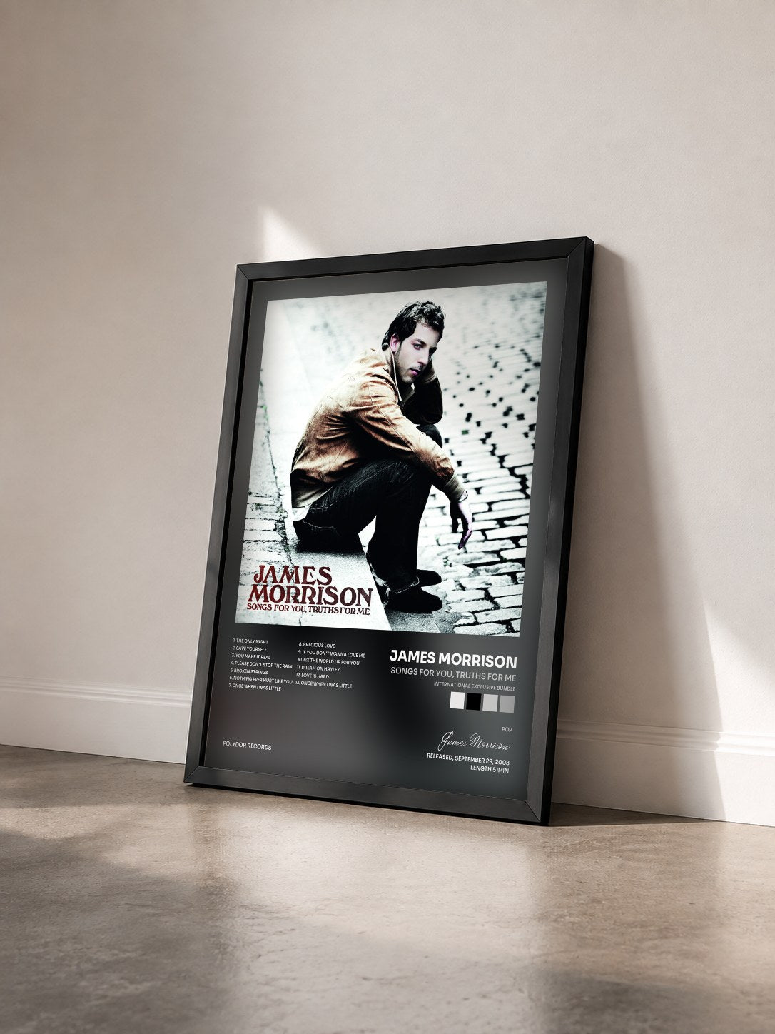 #noir Tableau de l'album Songs For You, Truths For Me (International Exclusive Bundle) de James Morrison vu de trois quarts, cadre noir