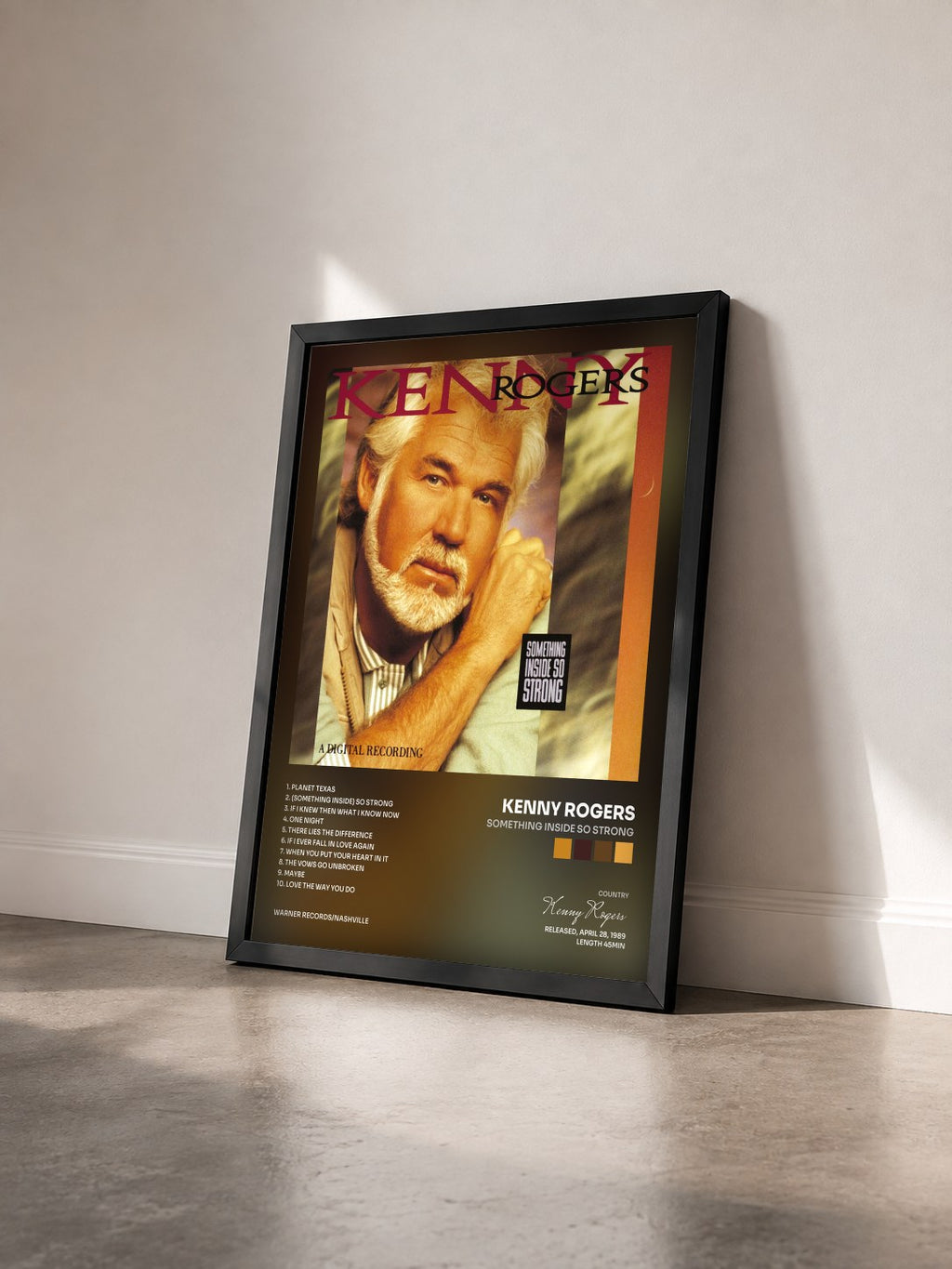 #noir Tableau de l'album Something Inside So Strong de Kenny Rogers vu de trois quarts, cadre noir