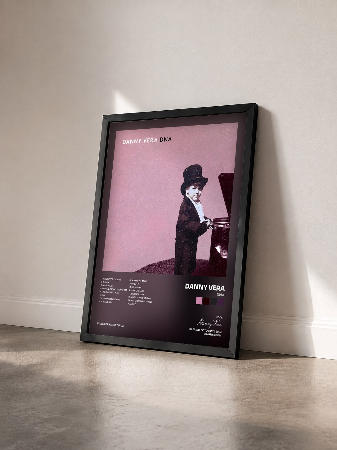 #noir Tableau de l'album DNA de Danny Vera vu de trois quarts, cadre noir