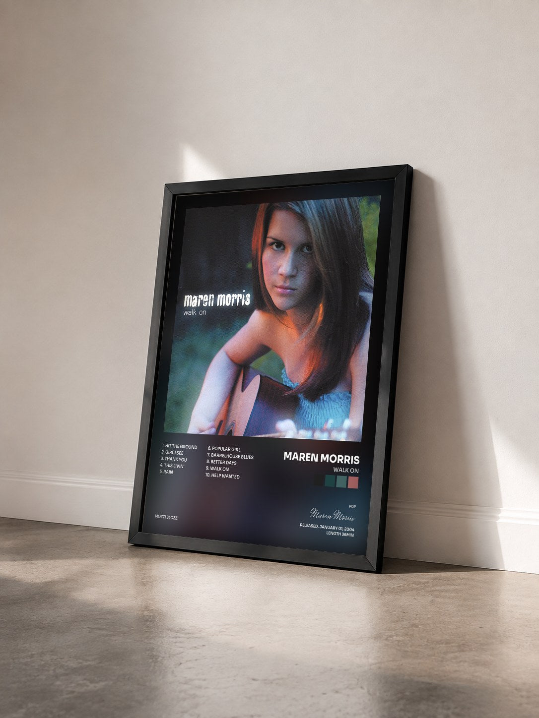#noir Tableau de l'album Walk On de Maren Morris vu de trois quarts, cadre noir