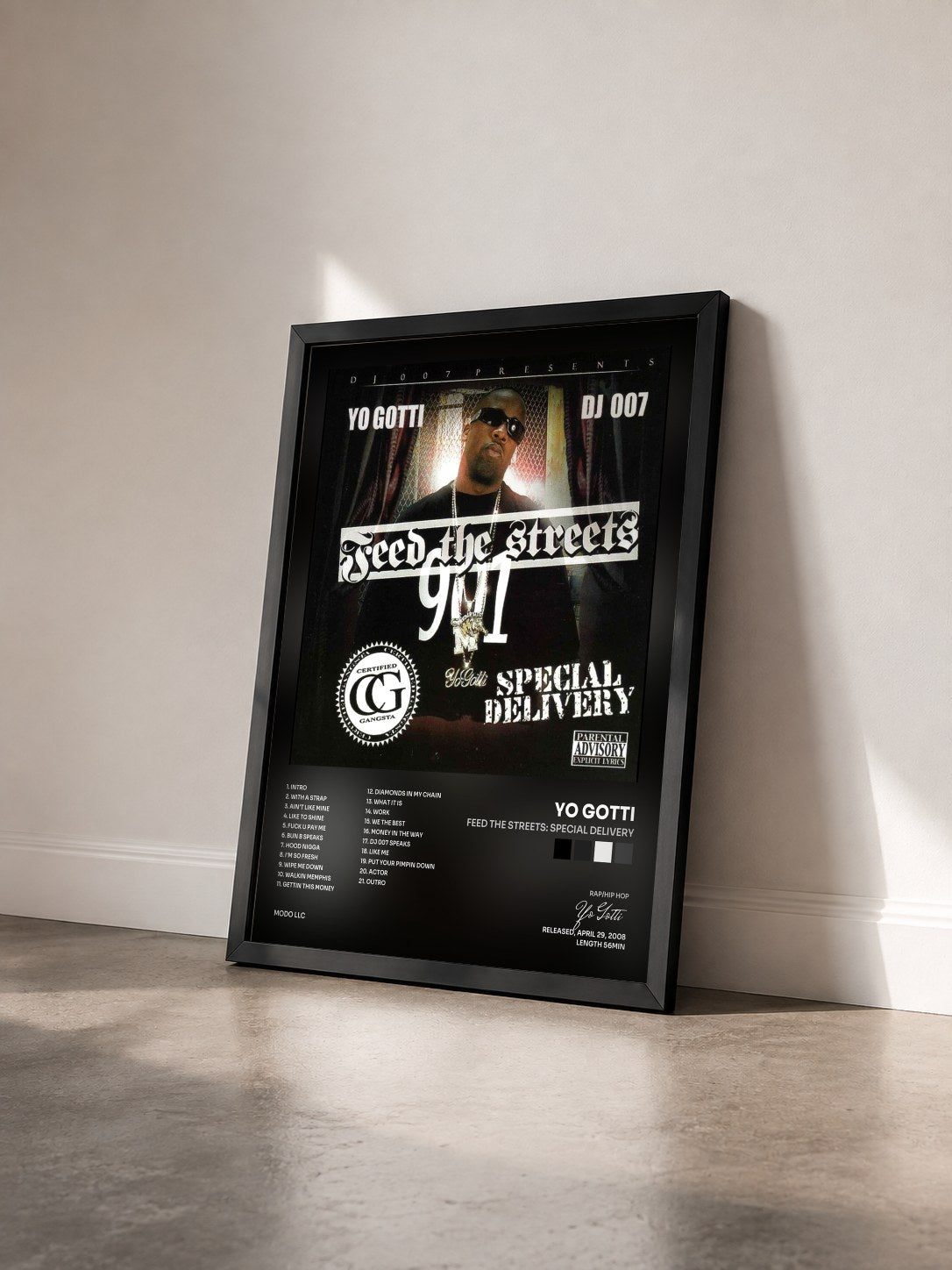 #noir Tableau de l'album Feed The Streets: Special Delivery de Yo Gotti vu de trois quarts, cadre noir