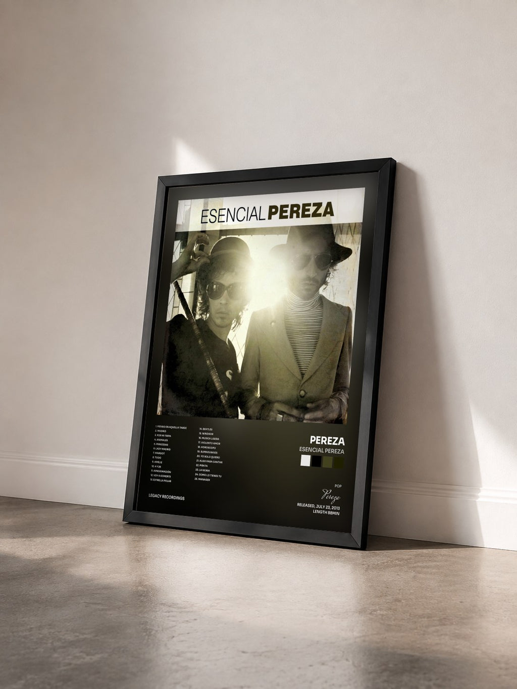 #noir Tableau de l'album Esencial Pereza de Pereza vu de trois quarts, cadre noir