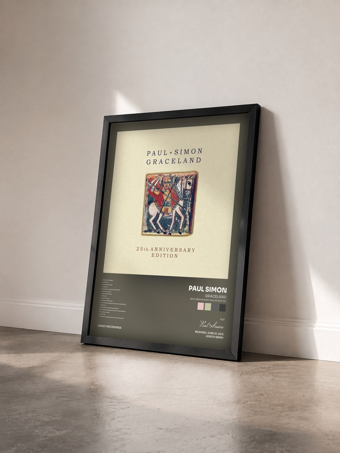 #noir Tableau de l'album Graceland (25th Anniversary Deluxe Edition) de Paul Simon vu de trois quarts, cadre noir