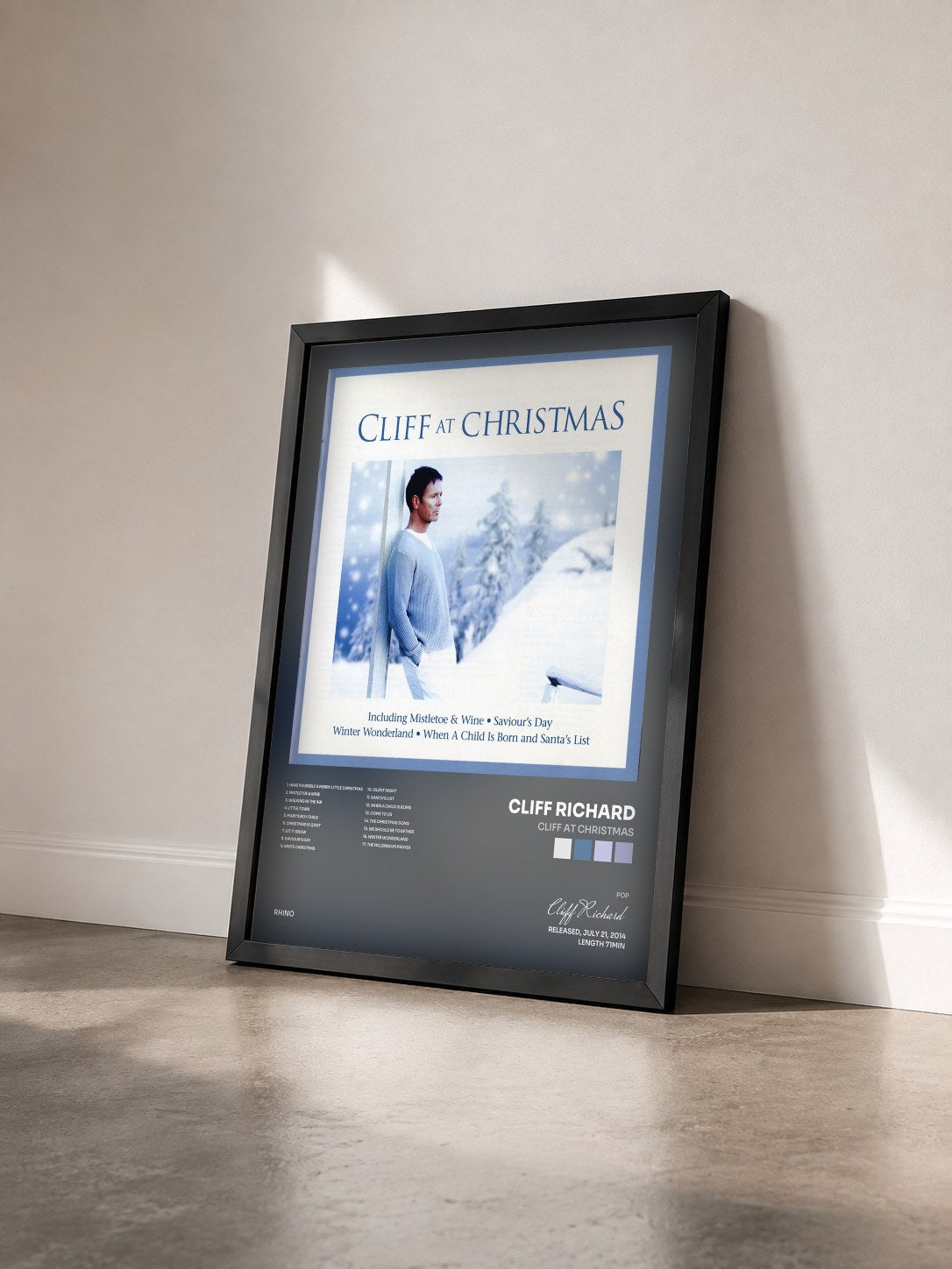 #noir Tableau de l'album Cliff at Christmas de Cliff Richard vu de trois quarts, cadre noir