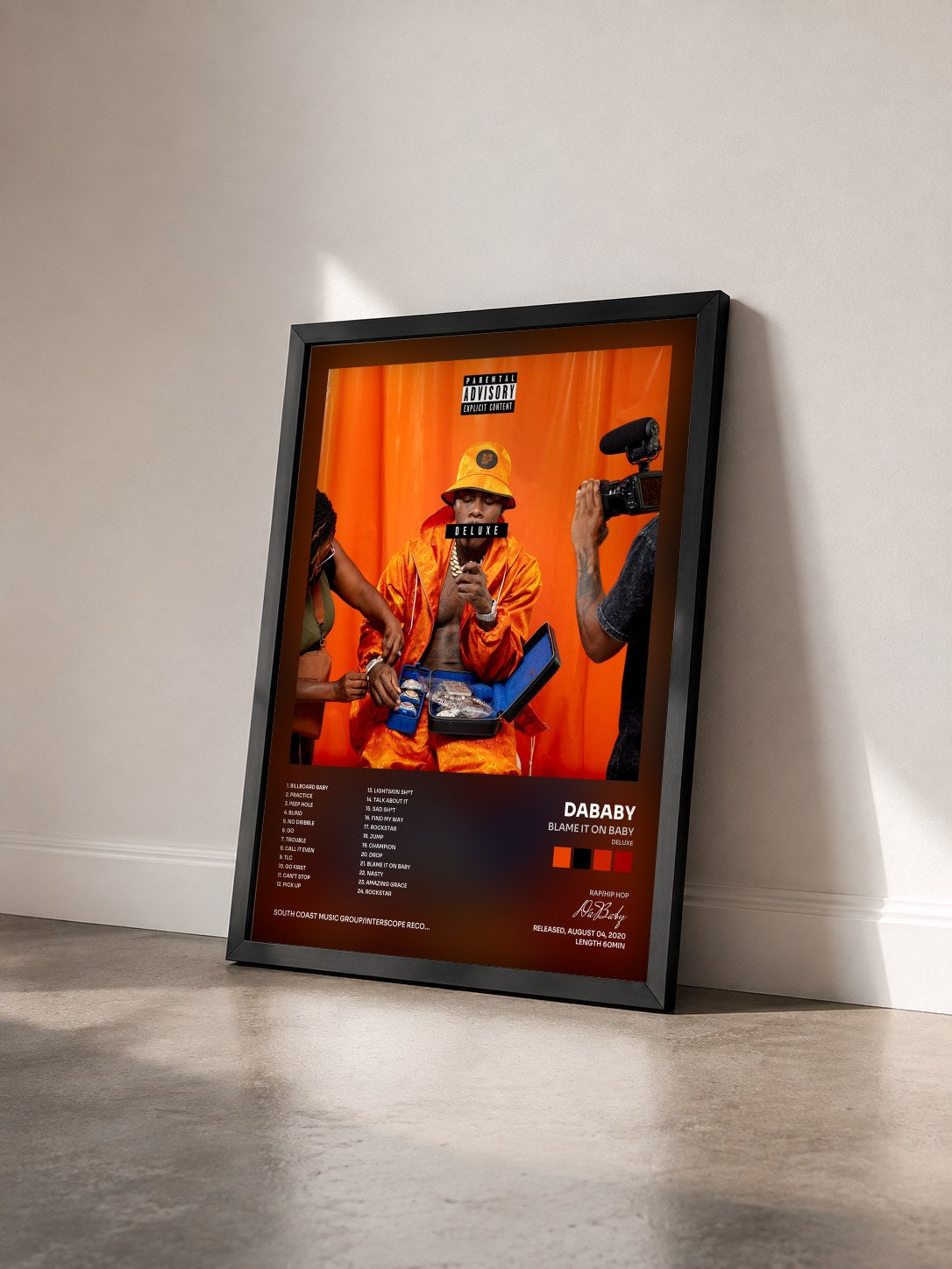 #noir Tableau de l'album BLAME IT ON BABY (DELUXE) de DaBaby vu de trois quarts, cadre noir