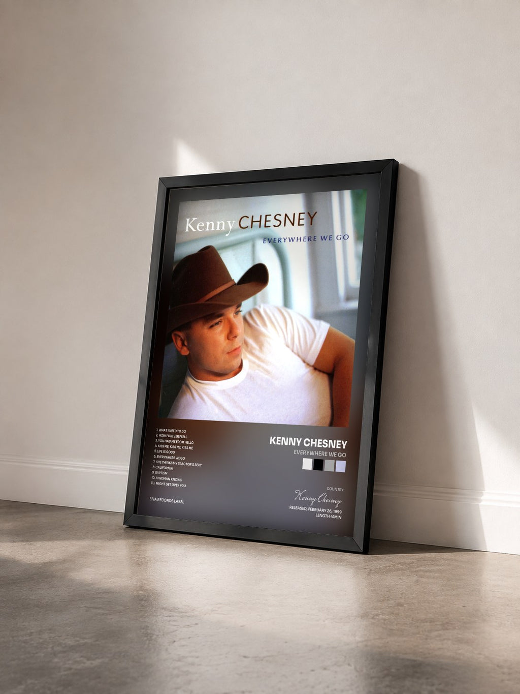 #noir Tableau de l'album Everywhere We Go de Kenny Chesney vu de trois quarts, cadre noir