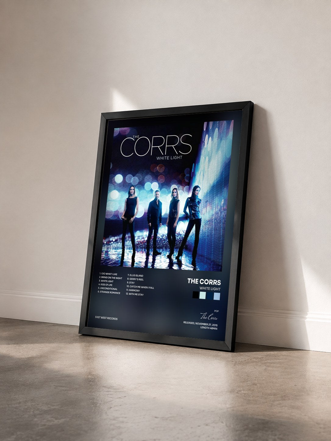 #noir Tableau de l'album White Light de The Corrs vu de trois quarts, cadre noir