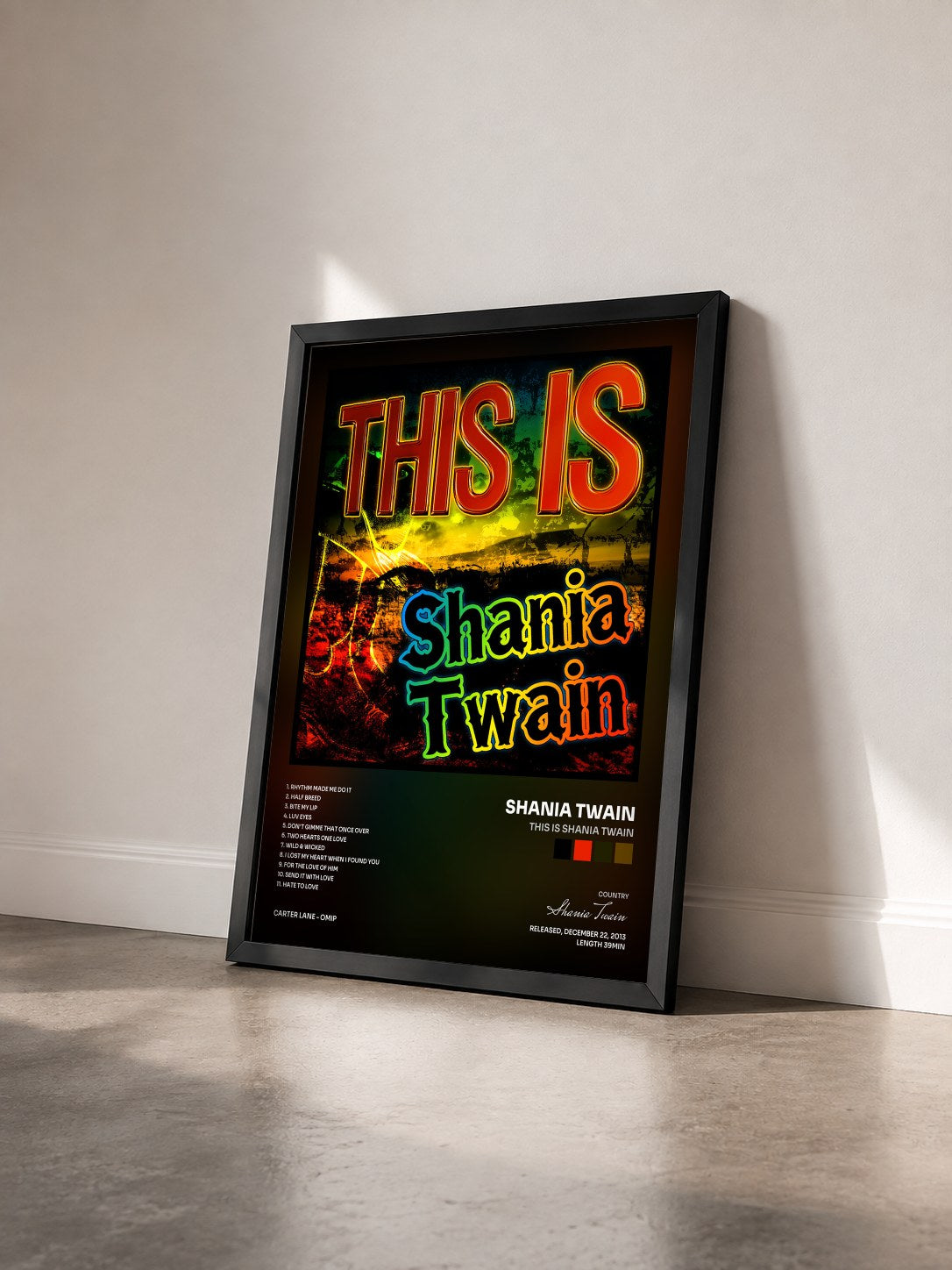 #noir Tableau de l'album This Is Shania Twain de Shania Twain vu de trois quarts, cadre noir
