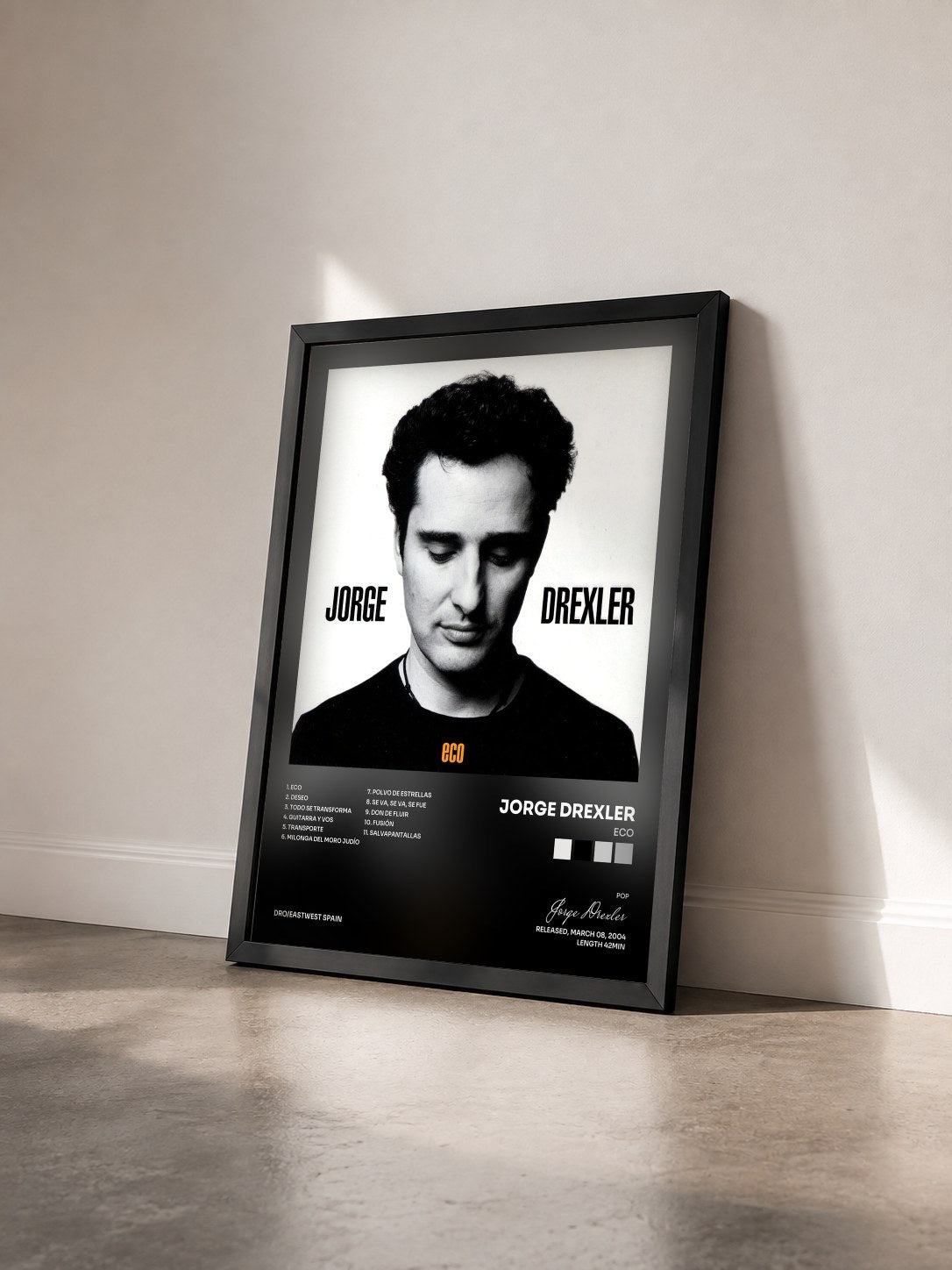 #noir Tableau de l'album Eco de Jorge Drexler vu de trois quarts, cadre noir