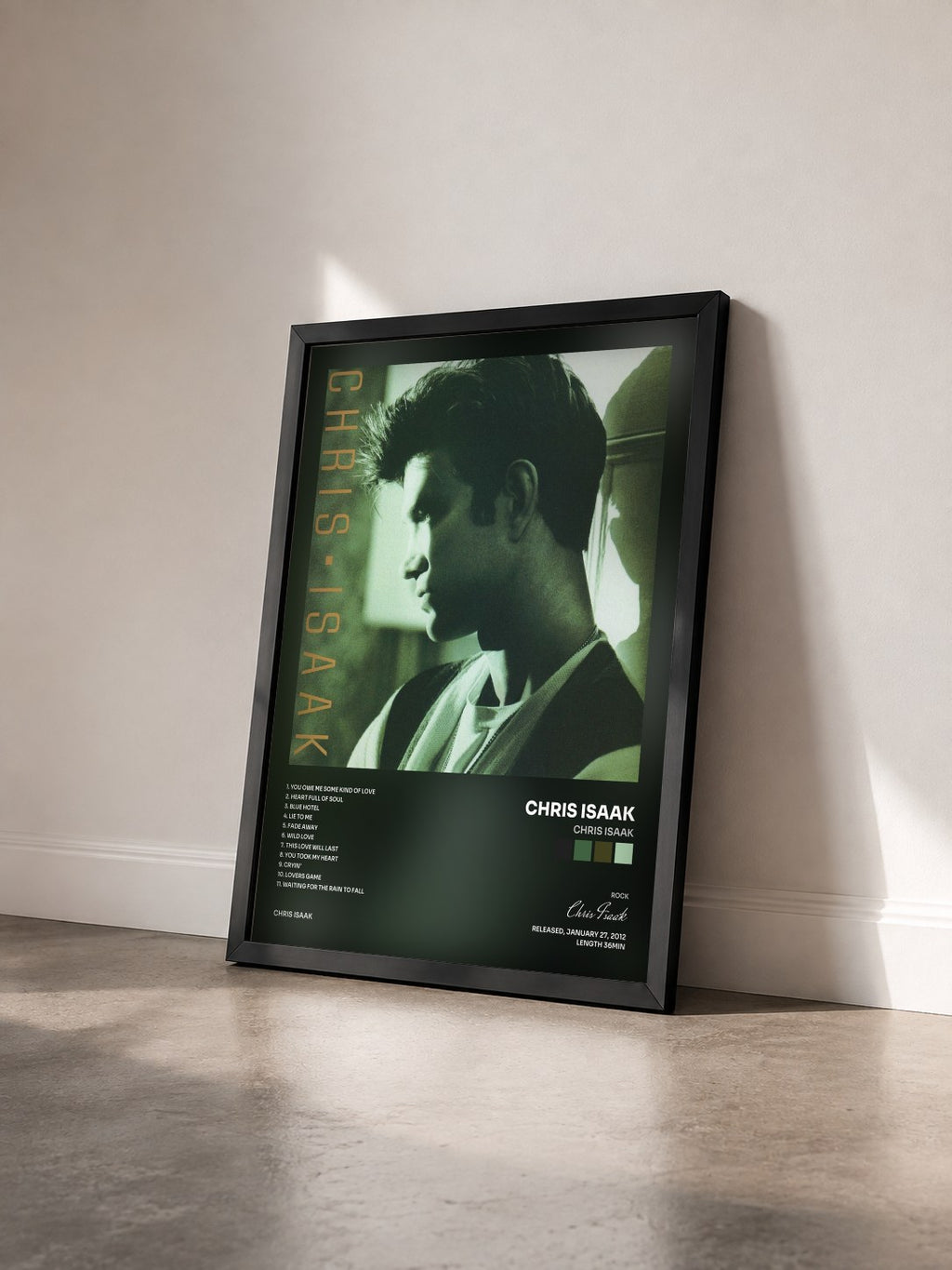 #noir Tableau de l'album Chris Isaak de Chris Isaak vu de trois quarts, cadre noir