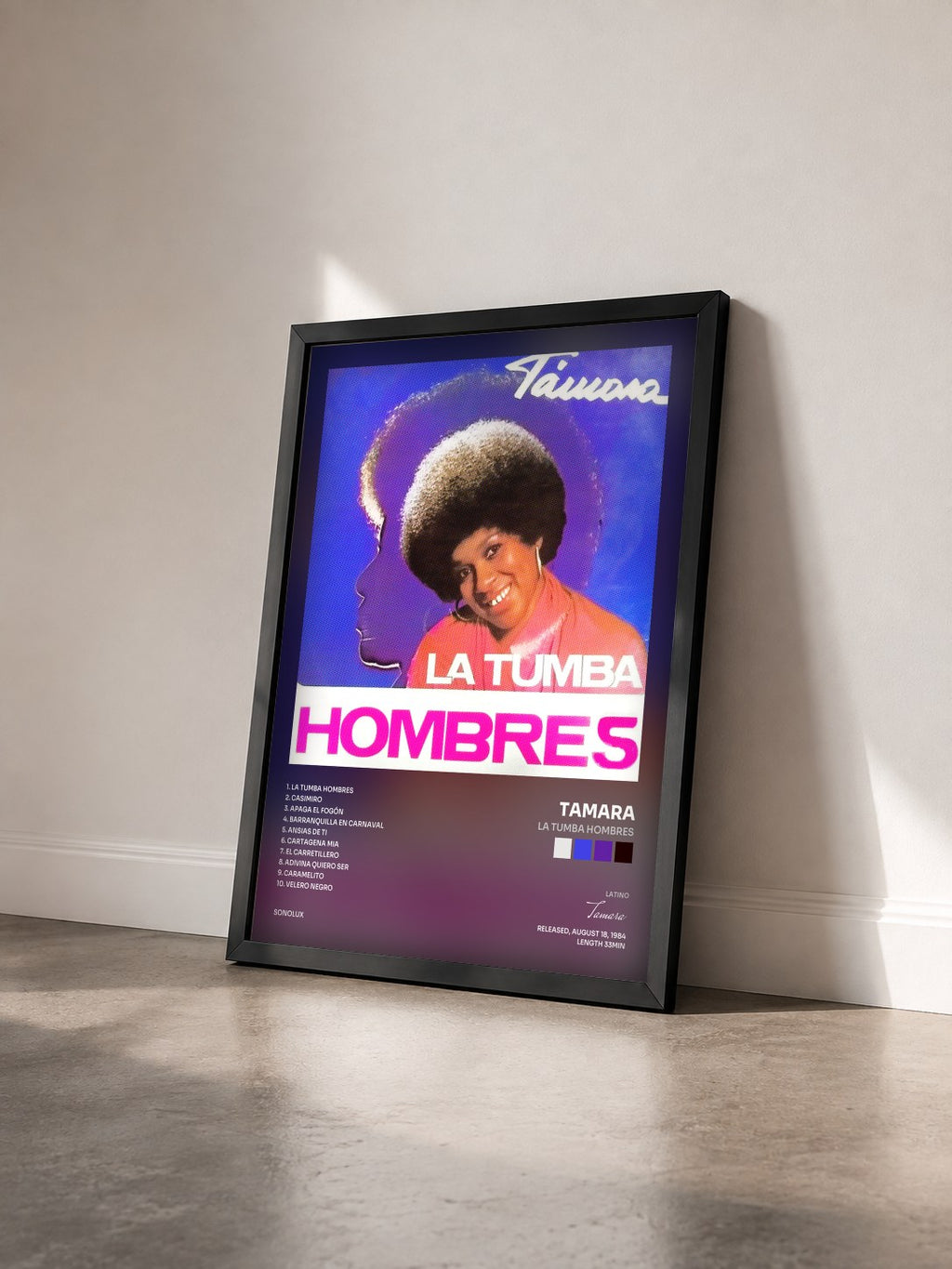 #noir Tableau de l'album La Tumba Hombres de Tamara vu de trois quarts, cadre noir