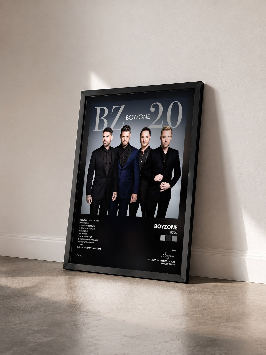 #noir Tableau de l'album BZ20 de Boyzone vu de trois quarts, cadre noir