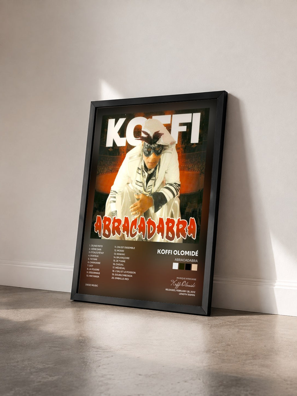 #noir Tableau de l'album Abracadabra de Koffi Olomidé vu de trois quarts, cadre noir