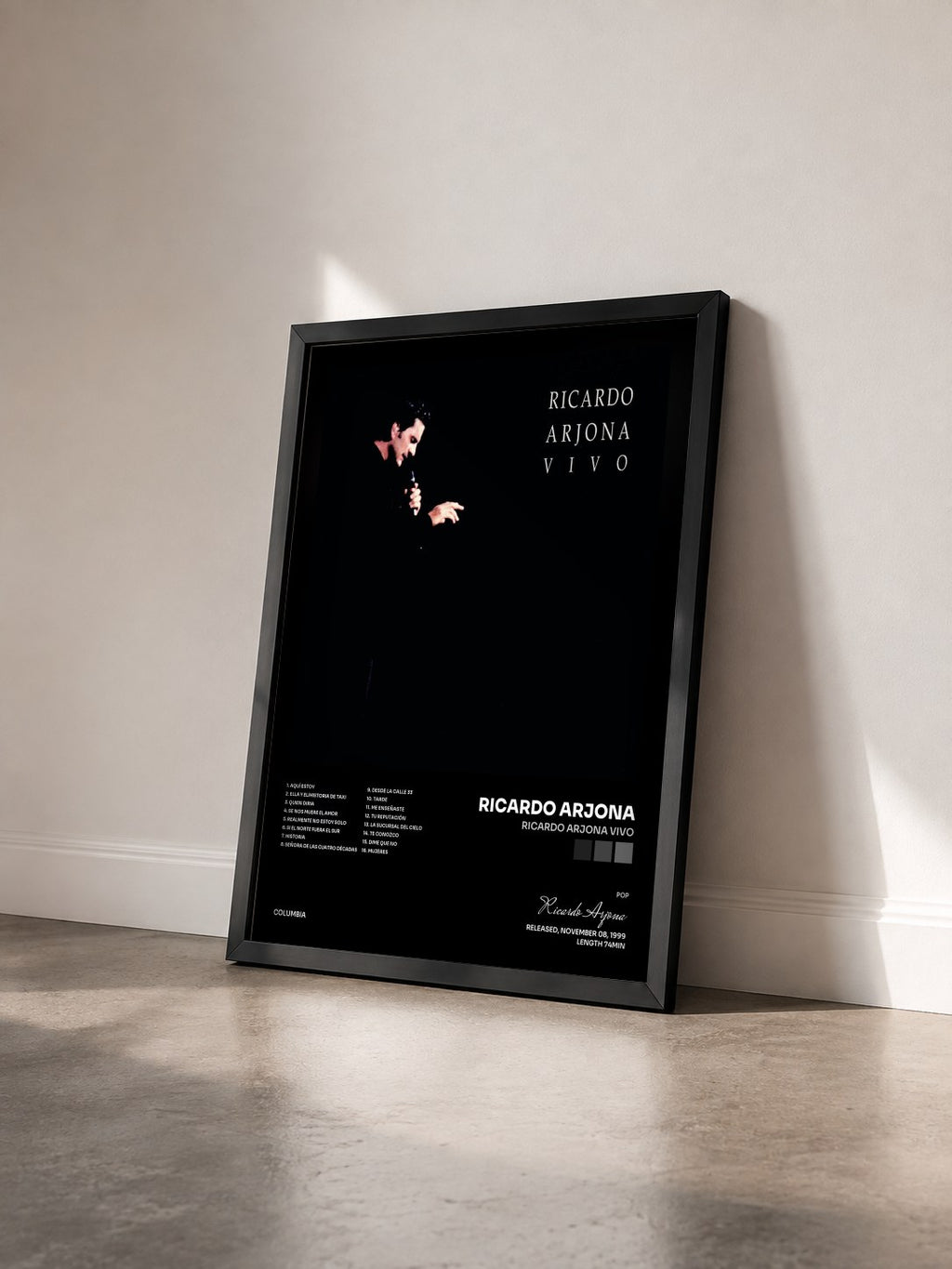 #noir Tableau de l'album Ricardo Arjona Vivo de Ricardo Arjona vu de trois quarts, cadre noir