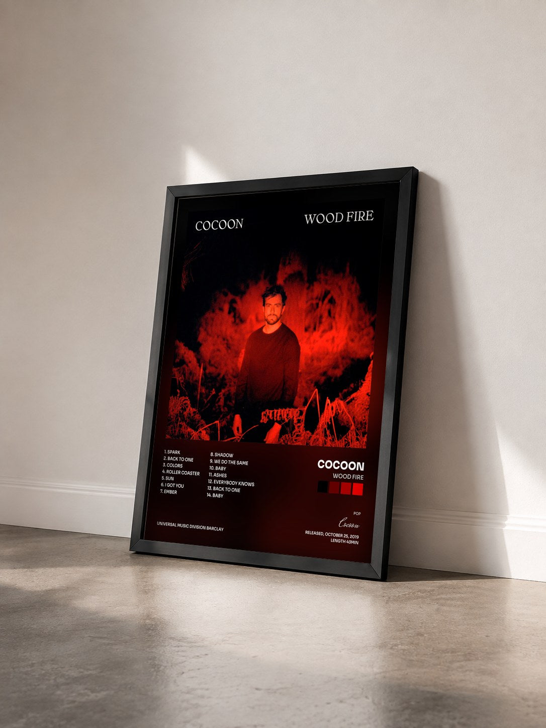 #noir Tableau de l'album Wood Fire de Cocoon vu de trois quarts, cadre noir