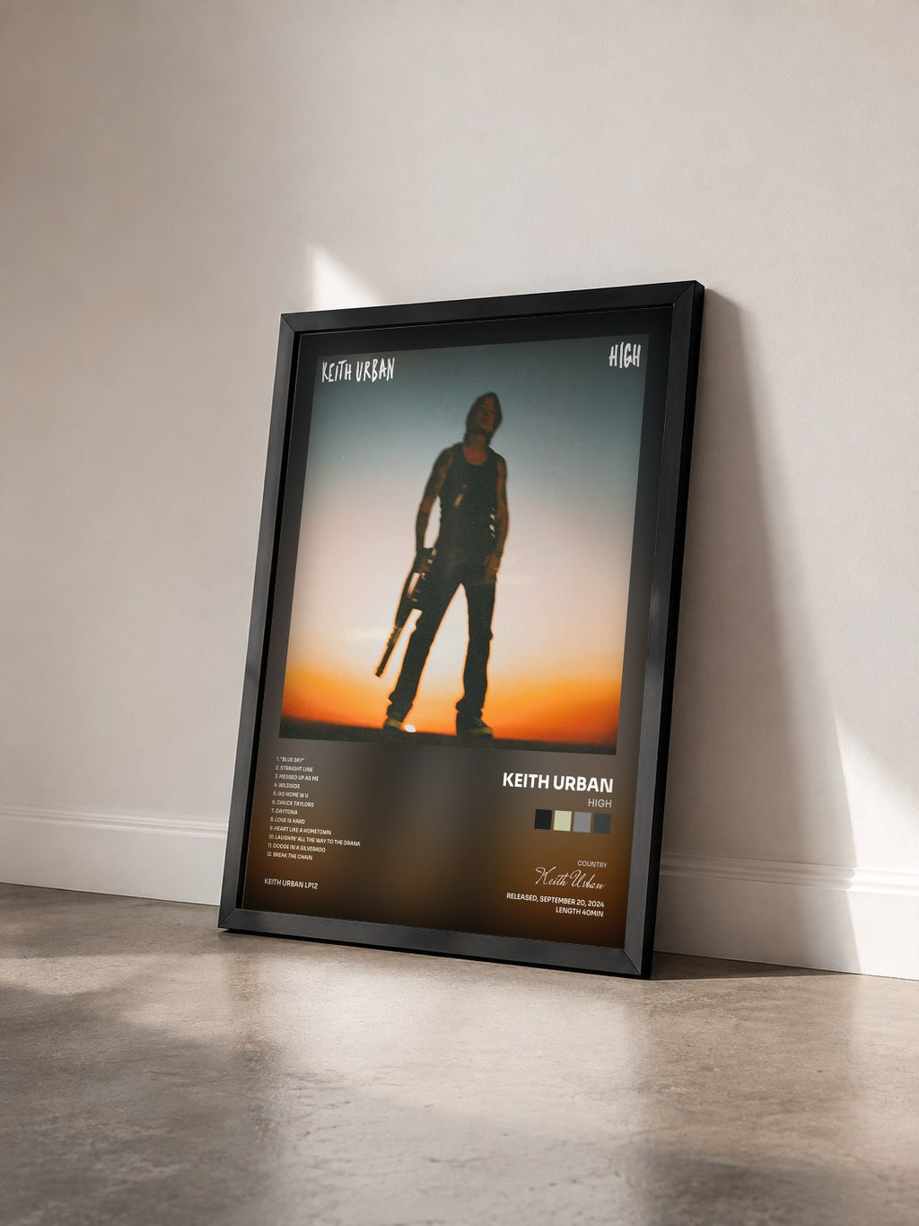 #noir Tableau de l'album HIGH de Keith Urban vu de trois quarts, cadre noir