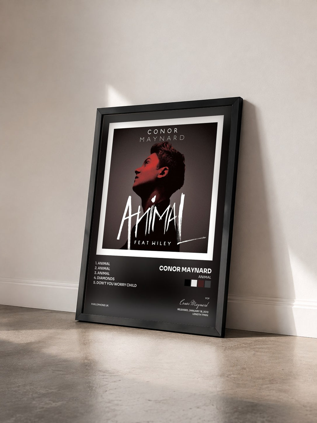 #noir Tableau de l'album Animal de Conor Maynard vu de trois quarts, cadre noir