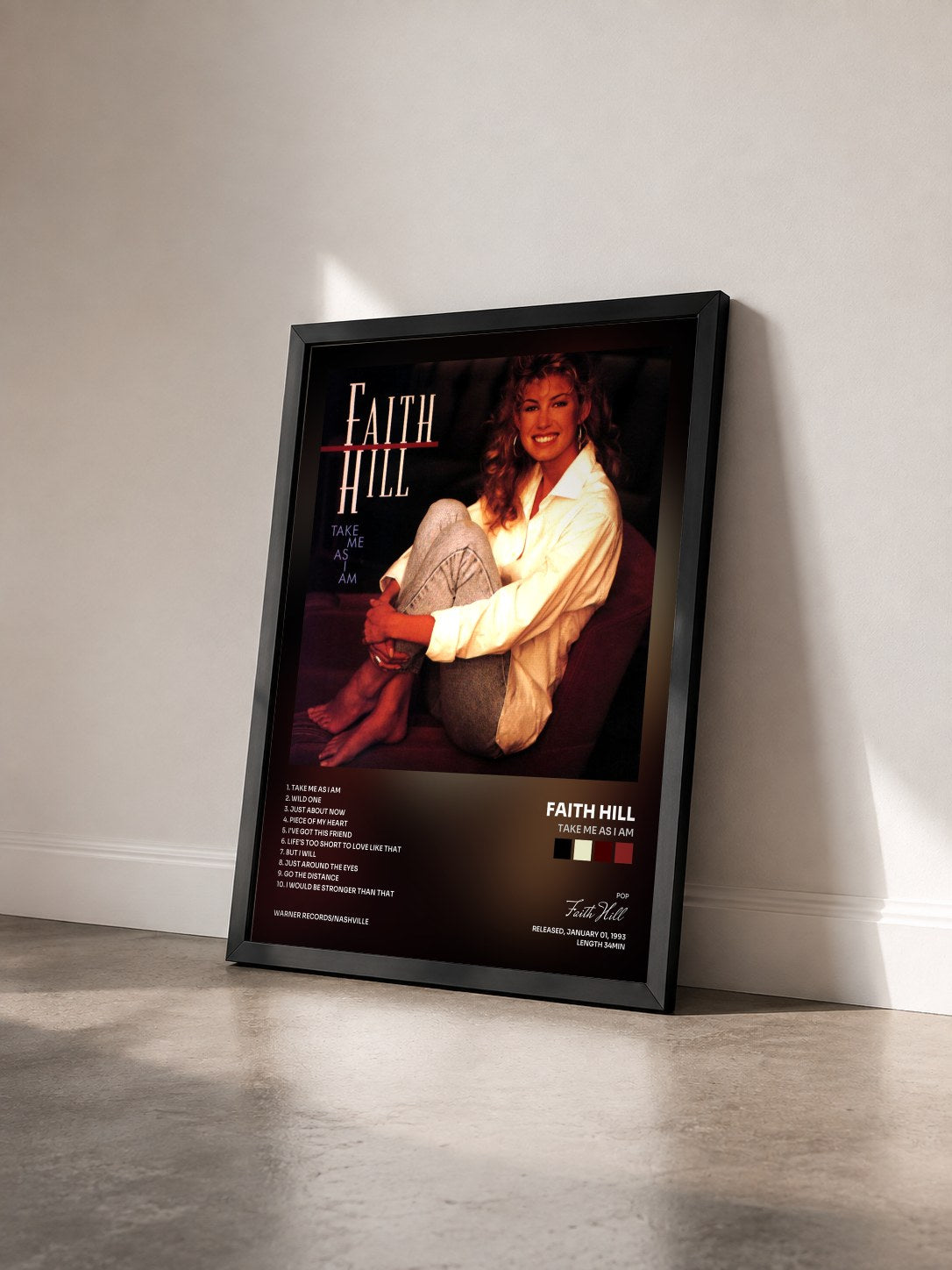 #noir Tableau de l'album Take Me as I Am de Faith Hill vu de trois quarts, cadre noir